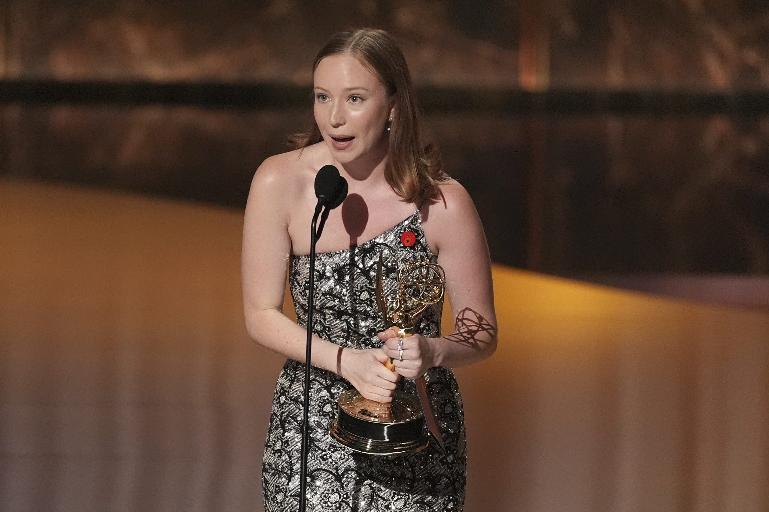 Hannah Einbinder accepts the award for outstanding supporting actress in...