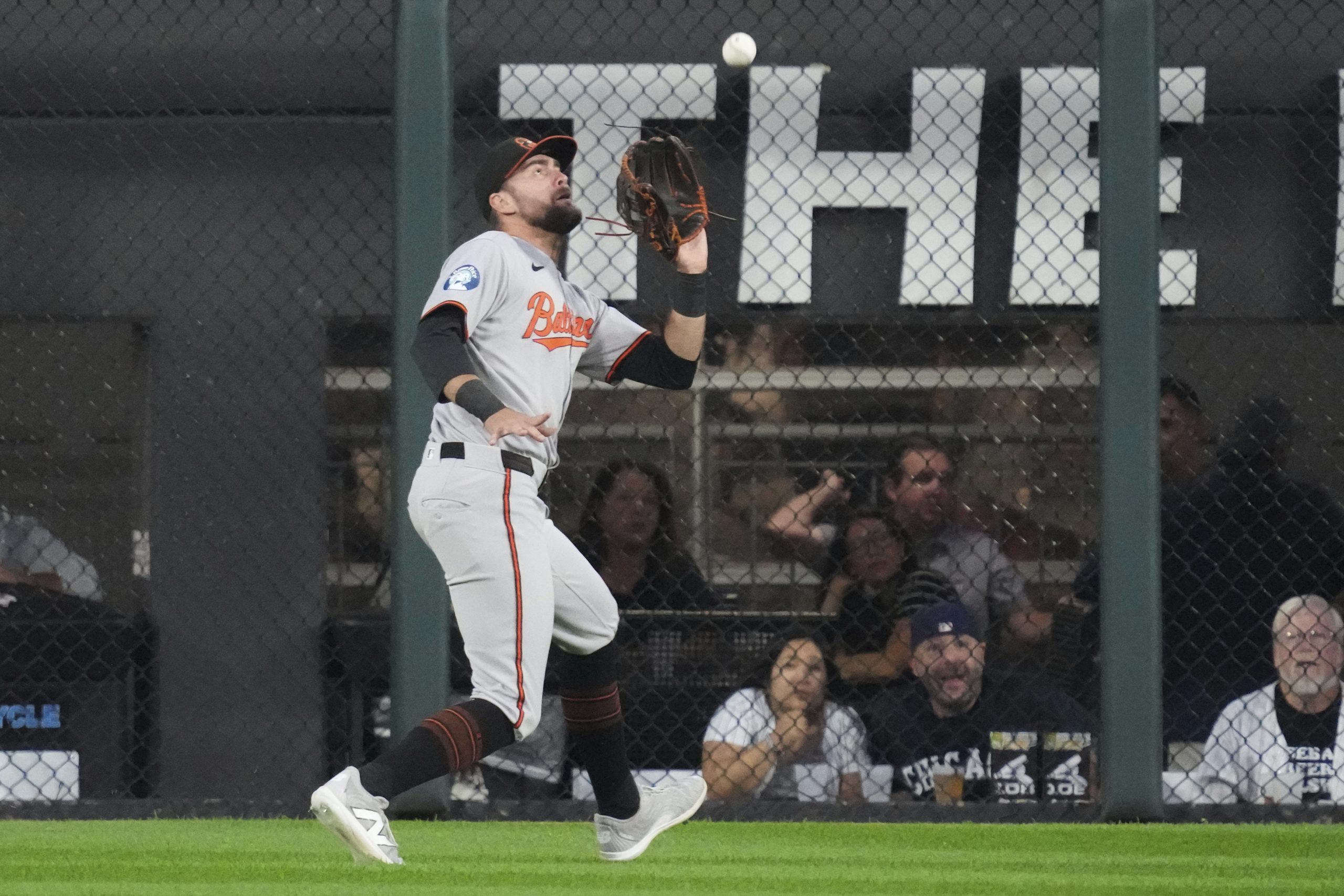 Baltimore Orioles center fielder Colton Cowser catches a fly ball...