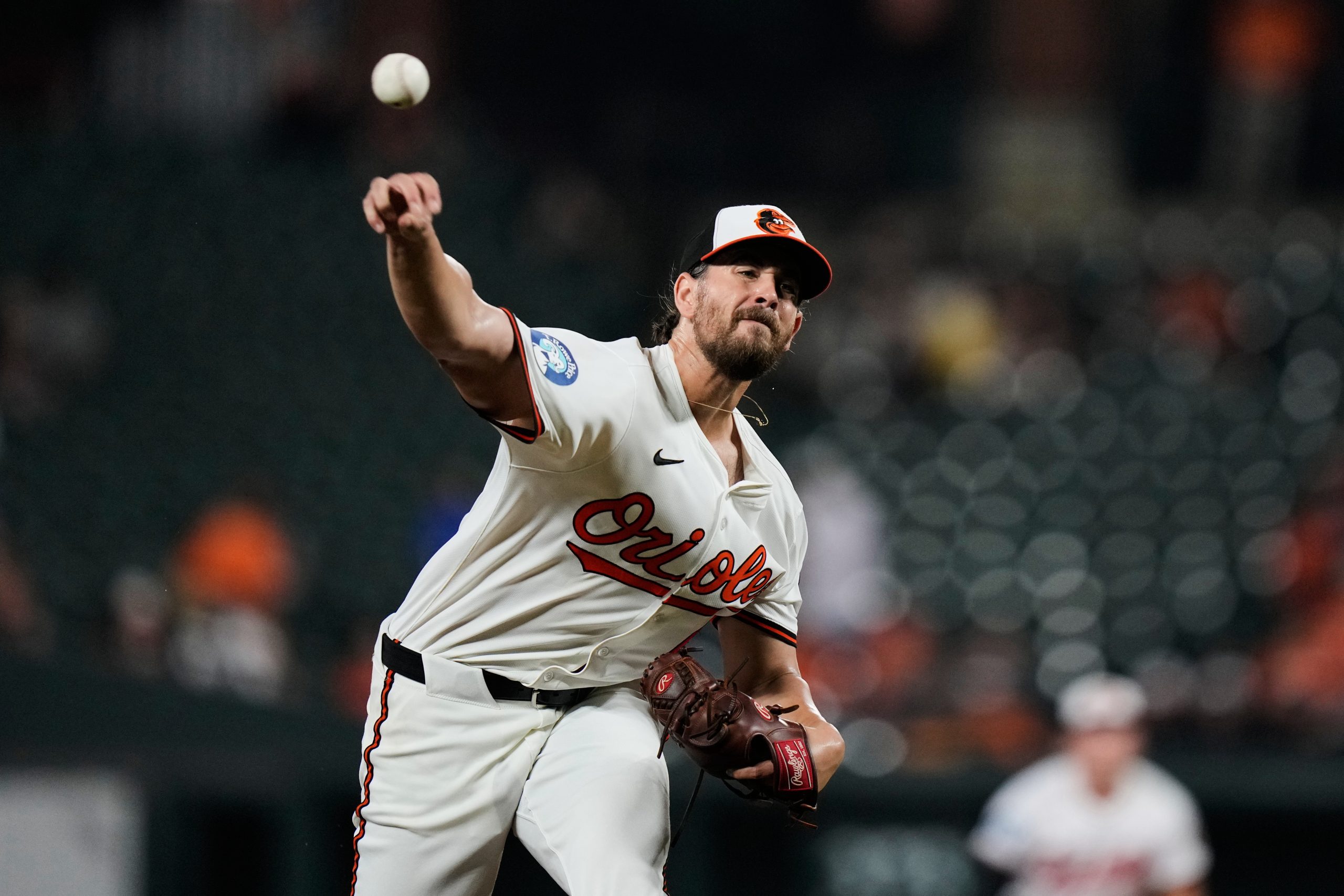 Orioles starting pitcher Dean Kremer delivers during the first inning...