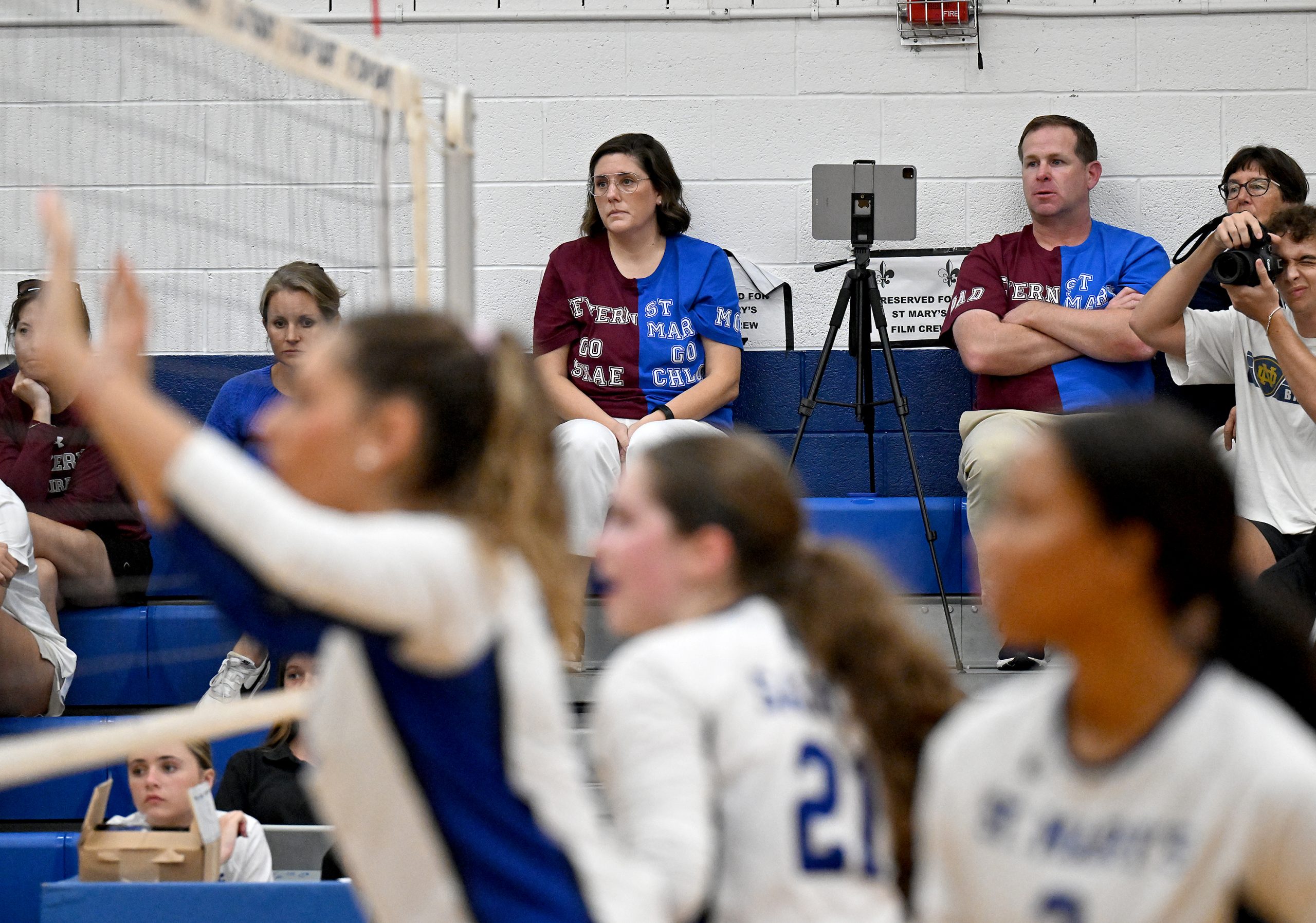 Shae and Chloe’s parents, Jamie and Chad Donnelly sit in...