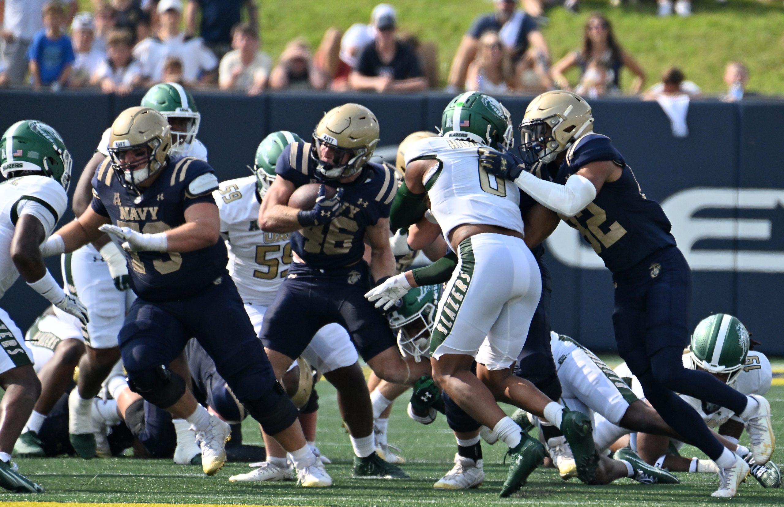 Navy’s Alex Tecza runs in the first quarter. The Navy...