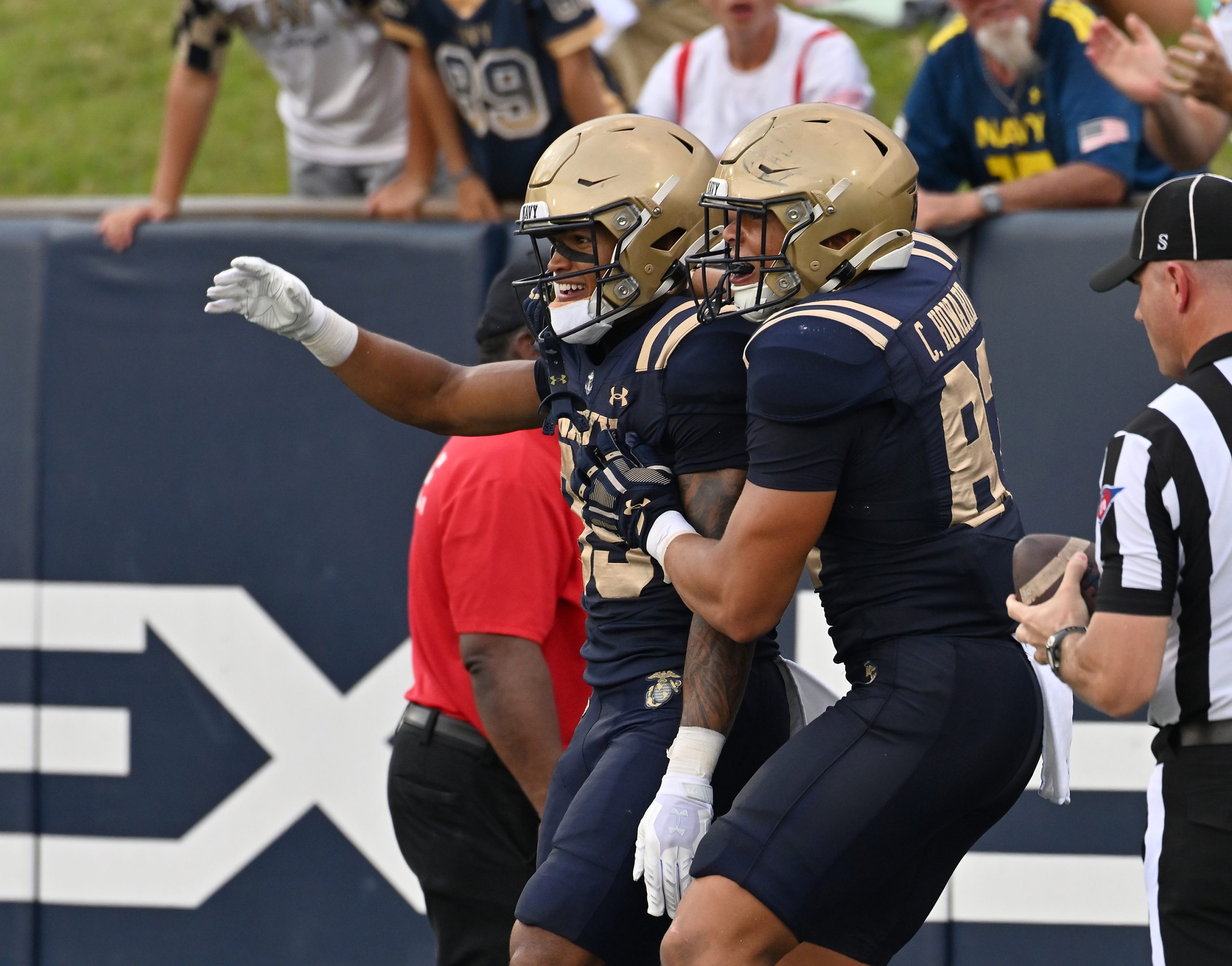 Navy’s Luke Hutchison celebrates a touchdown catch in the second...