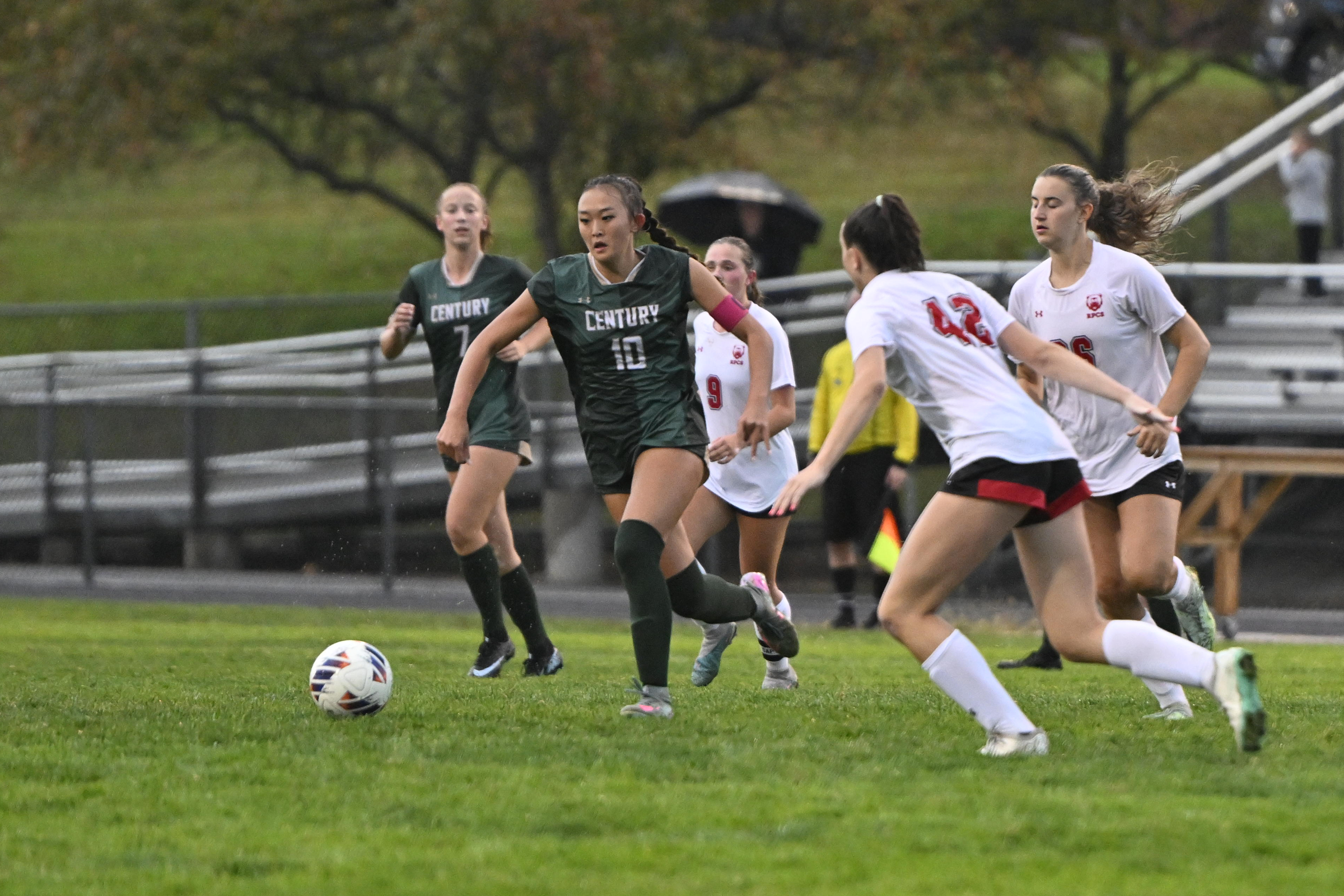 Lenah Ham dribbles the ball during a soccer match at...