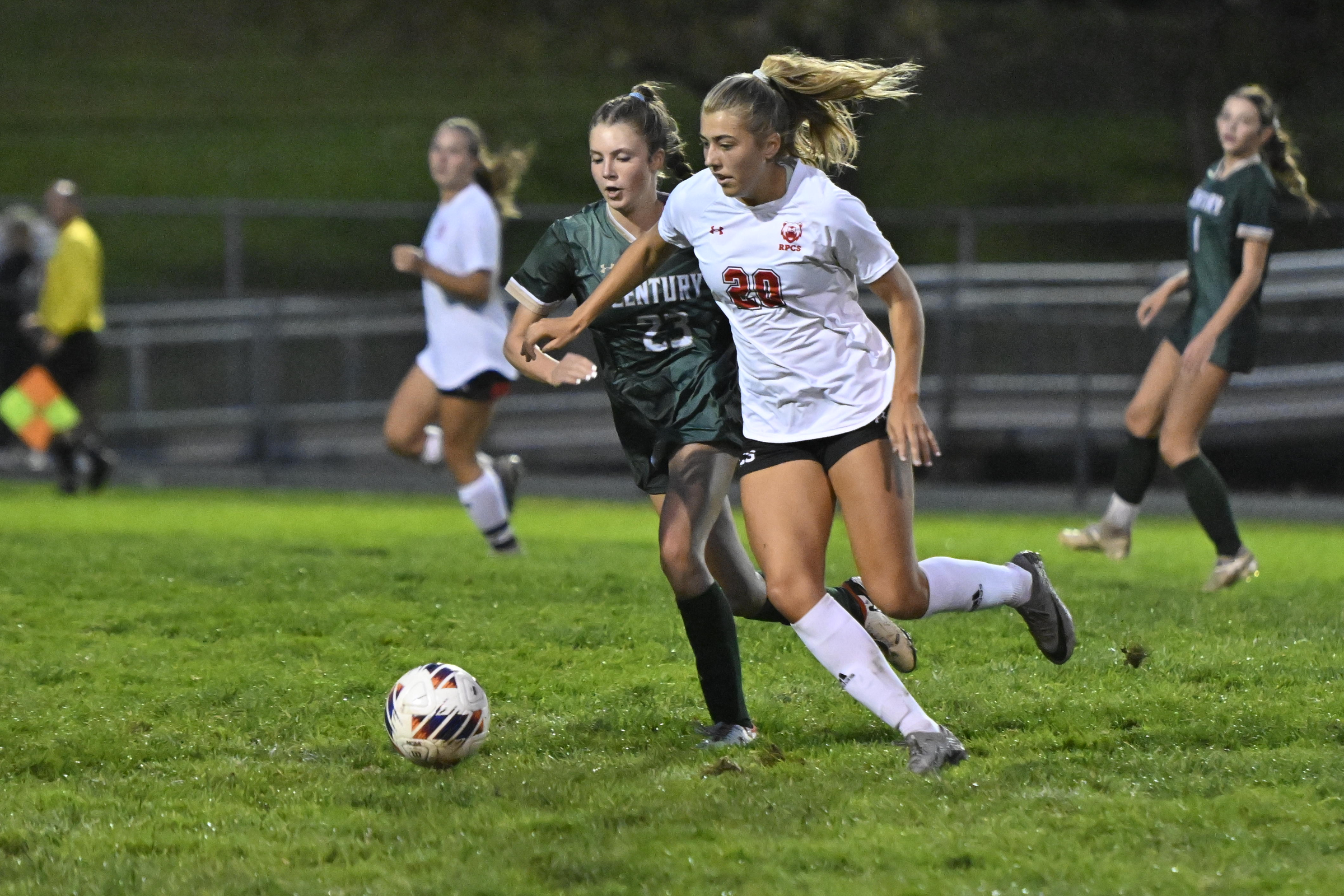 Roland Park's Reagan Ramsey and Century's Khloe Schaeffer race after...