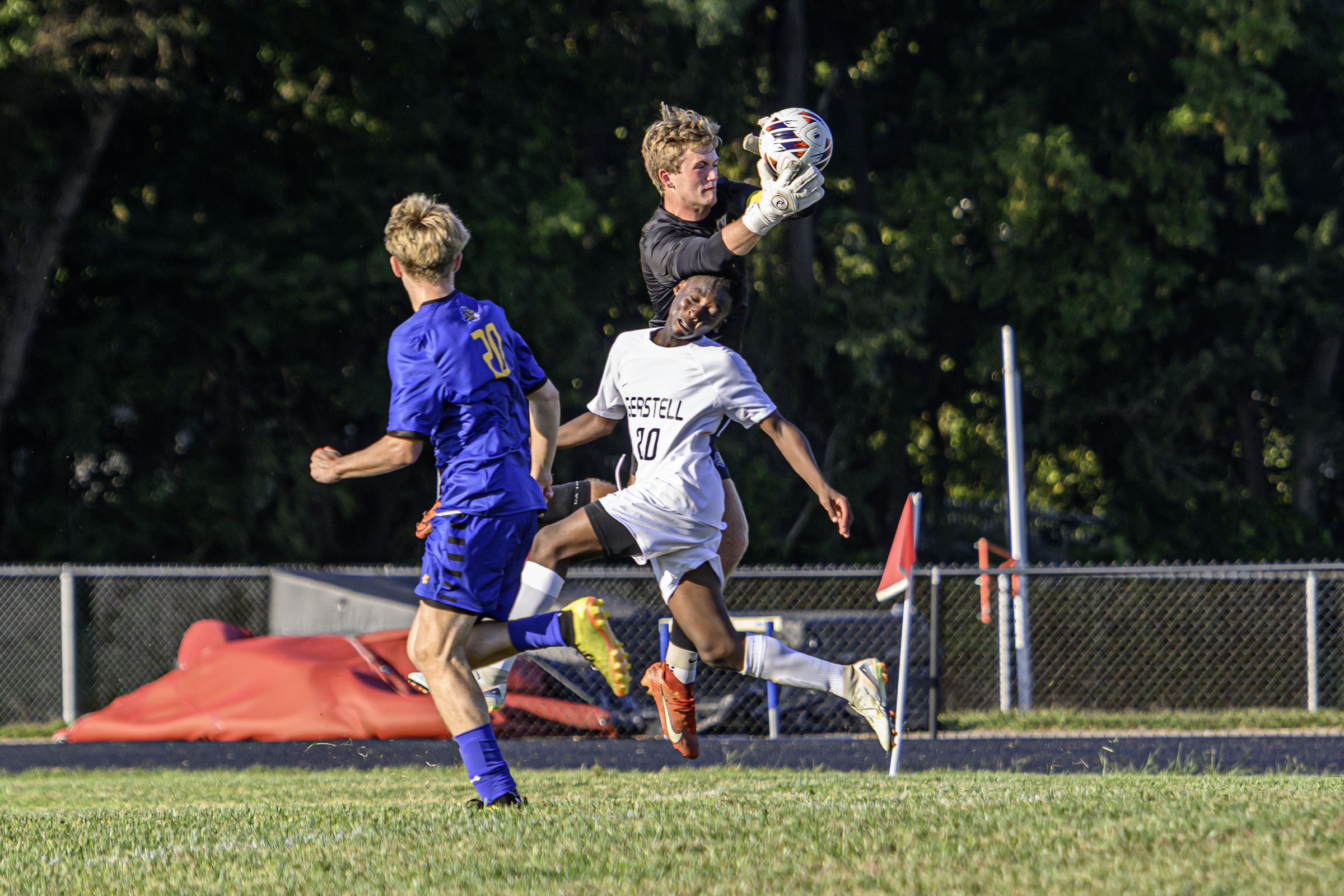 Liberty goalie Jaxon Vanderhoof grabs the ball over Gerstell's Simon...