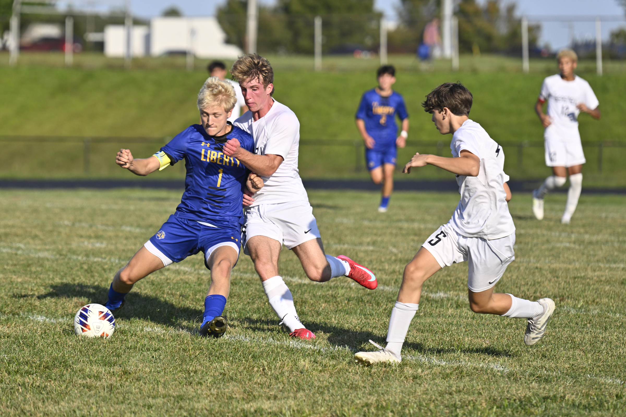 Cooper Geidel shields the ball from Gerstell's Darren Fling during...
