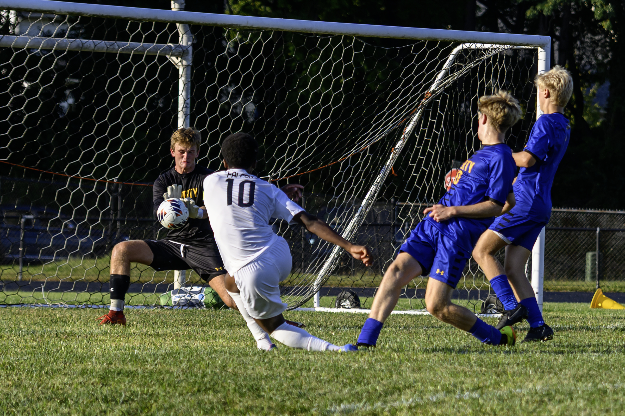 Liberty goalie Jaxon Vanderhoof stops a strong shot from Gerstell's...