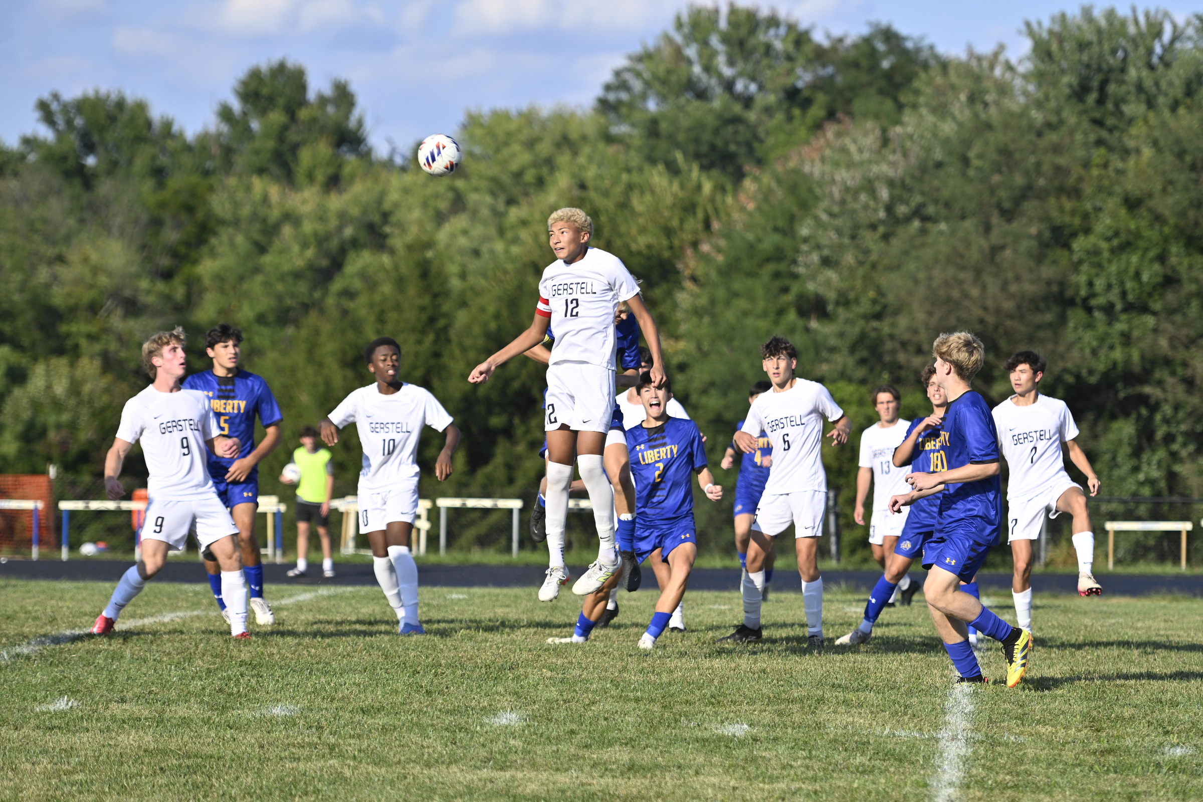 Gerstell's Amari Bowman heads the ball during a soccer match...