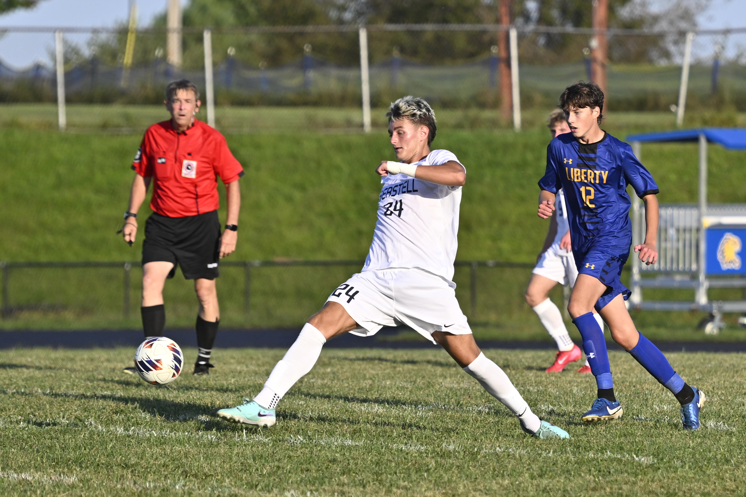 Gerstell's Davis Quenzier kicks the ball during a soccer match...