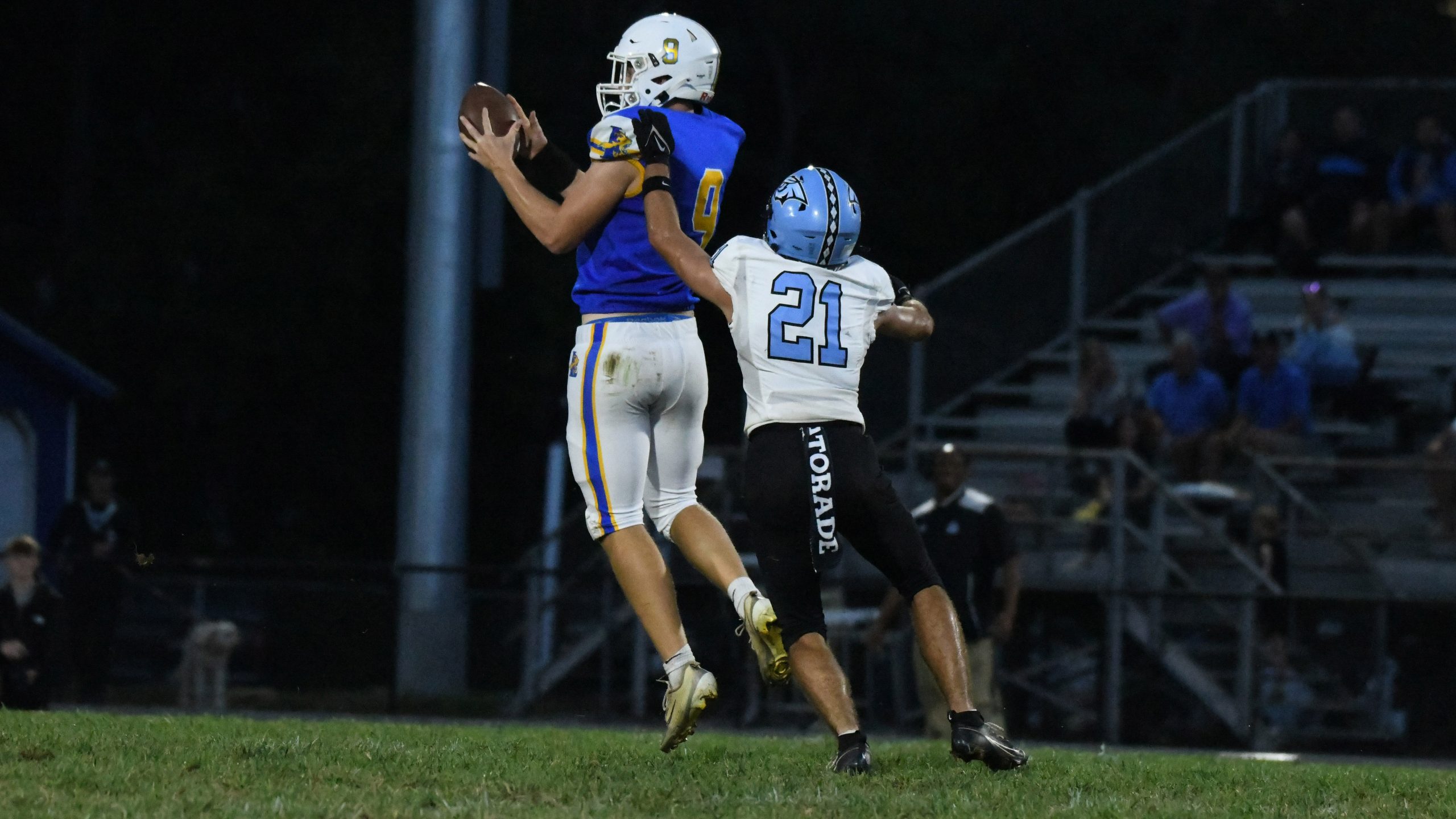 Liberty's Carter Weddle makes a catch in front of Westminster...