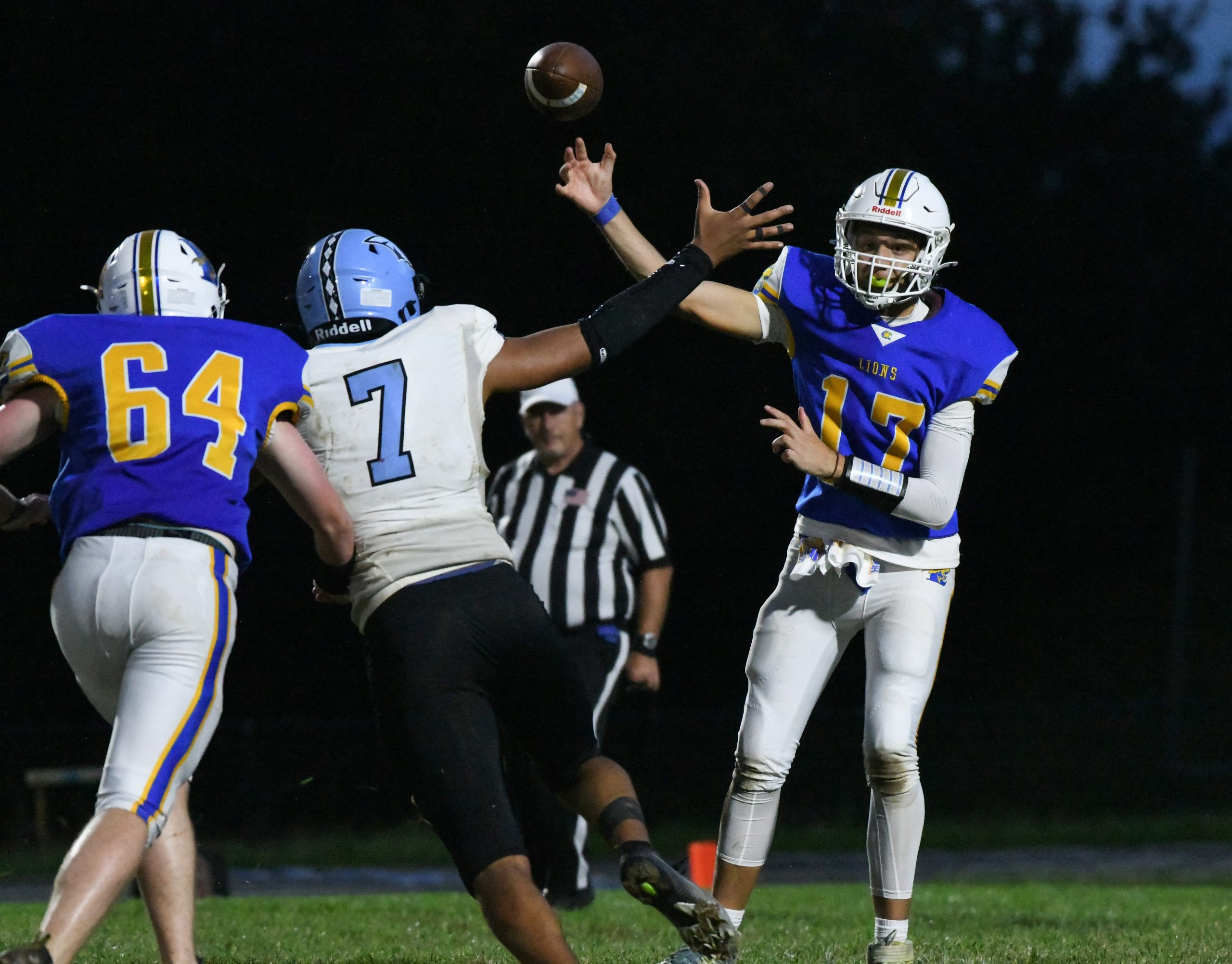 Liberty's Sean Case releases a throw over the reach of...