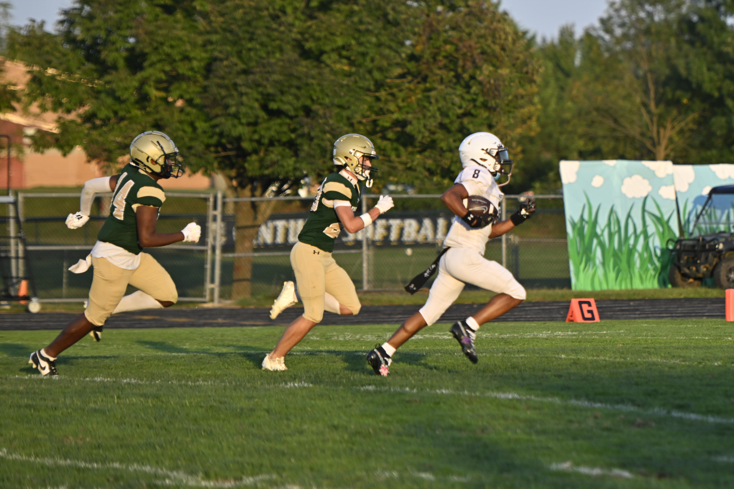 Marriotts Ridge's Rodney Butler runs for a long touchdown during...