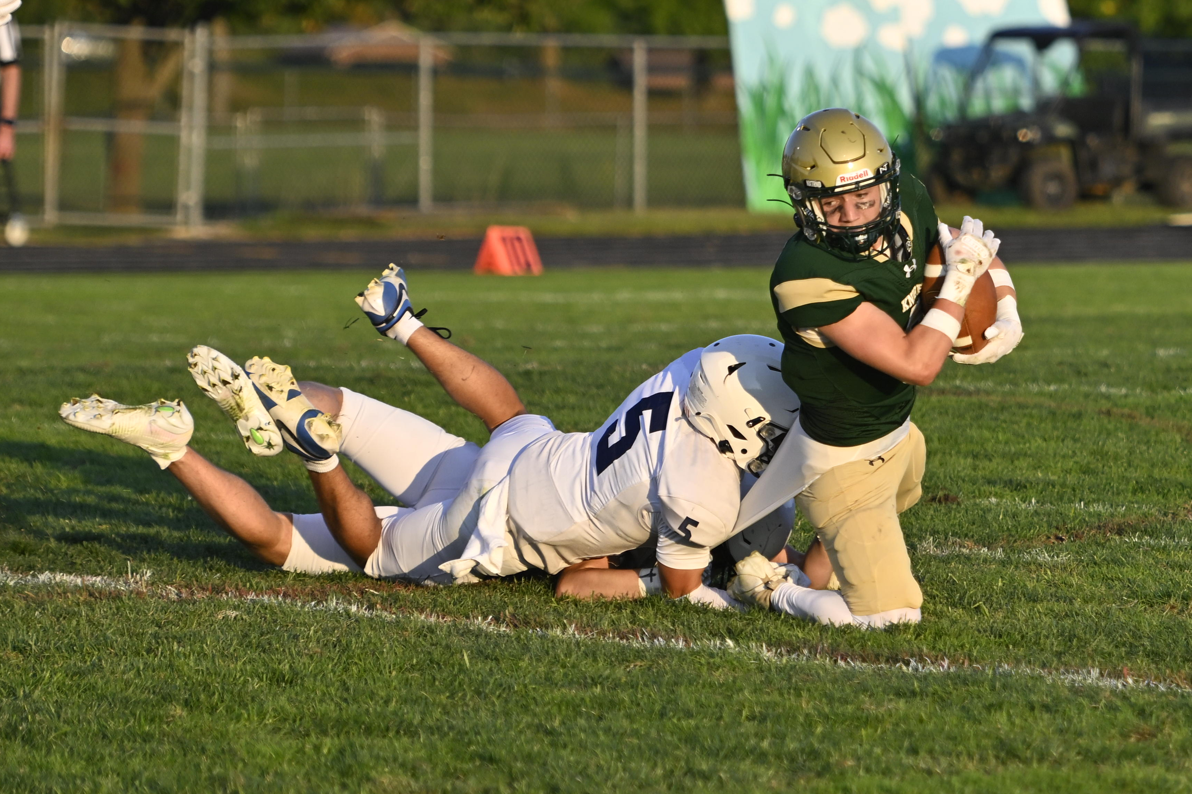 Marriotts Ridge's Sebi Alonso and Dom Funkhouser Dawson pull down...