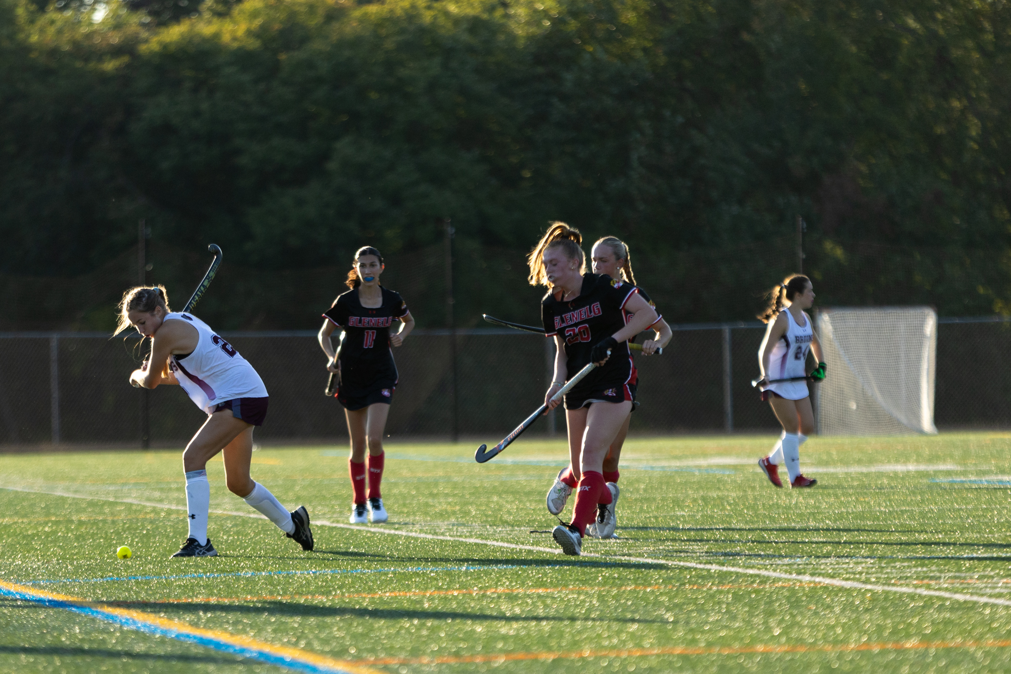 Broadneck’s Lizzie Hall clears the ball out of the Bruins...