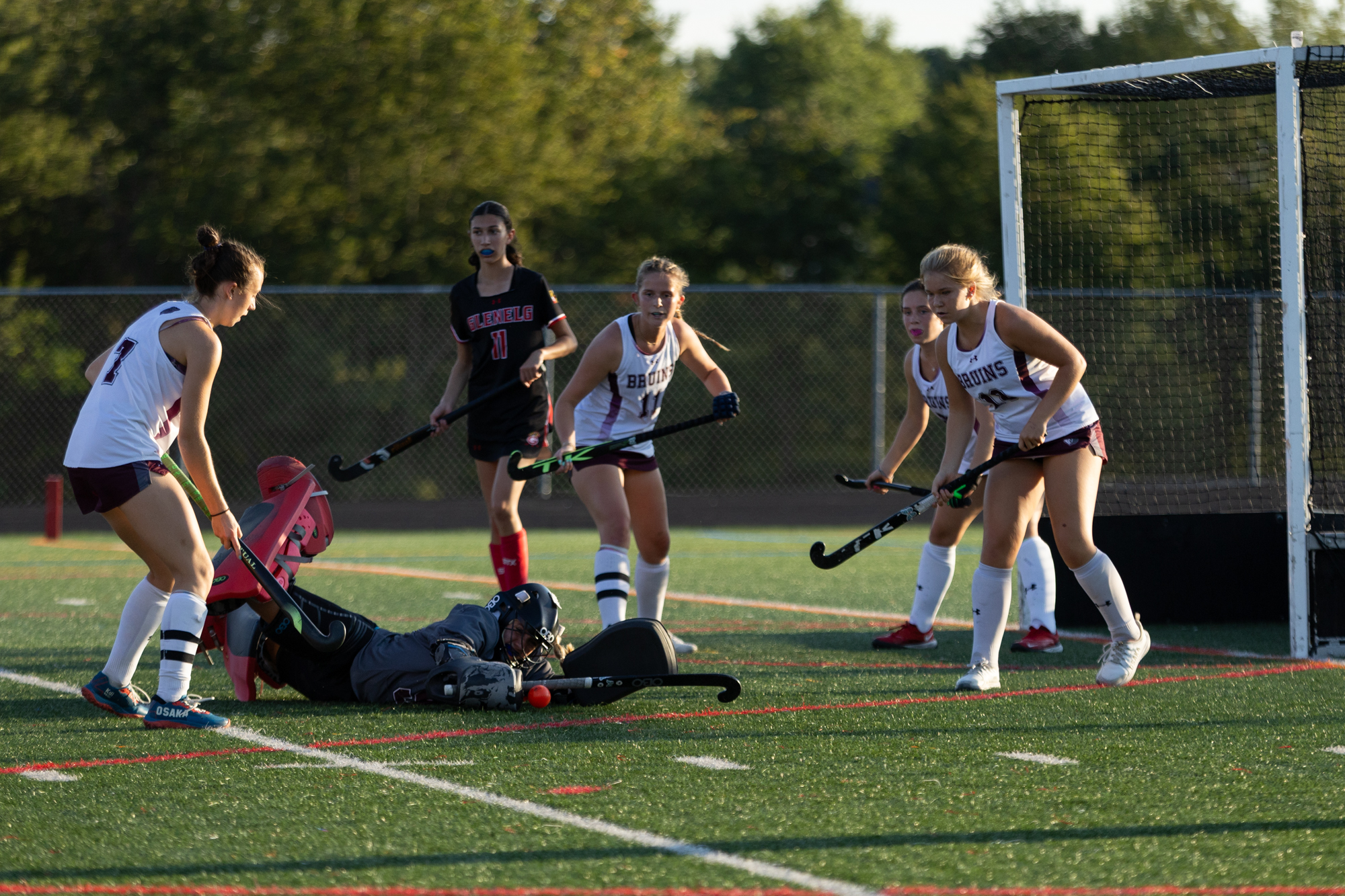 Broadneck goaltender Trisha Maloney makes a diving save during the...