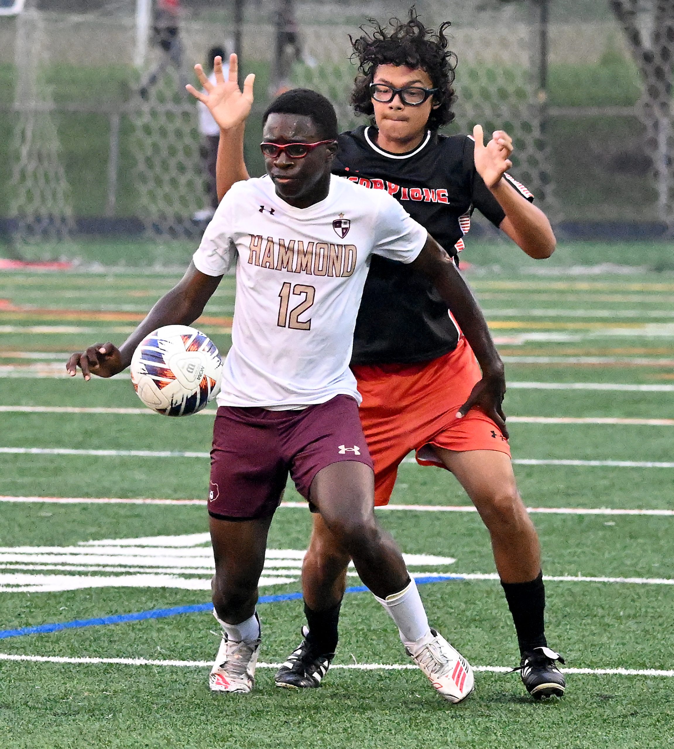 Hammond #12, Chigozie Amaechi controls the ball in the 1st...