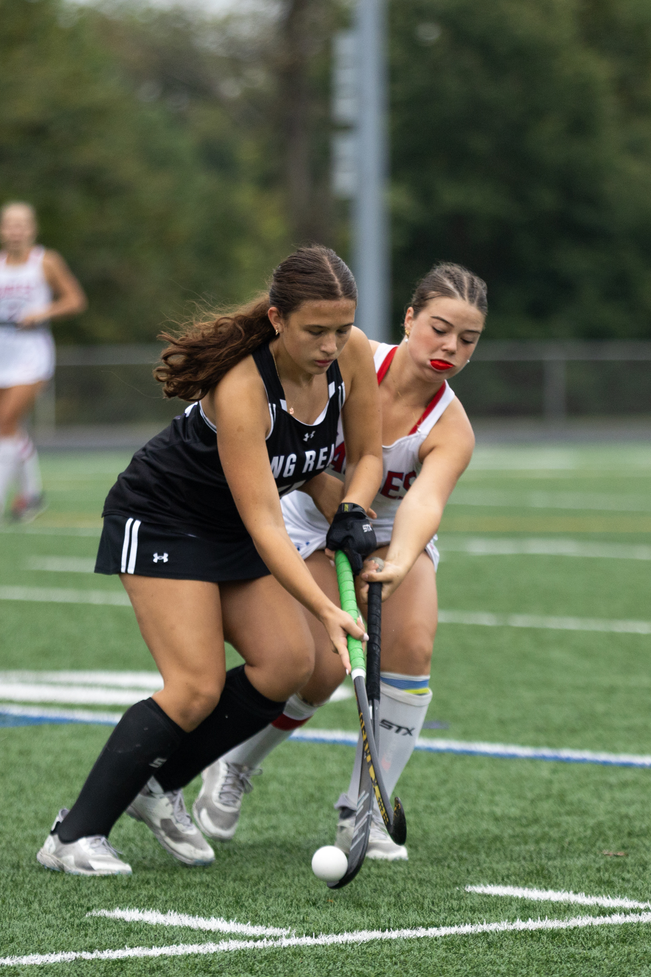 Long Reach’s Morgan Reynolds and Centennial’s Annabel Arrington fight for...