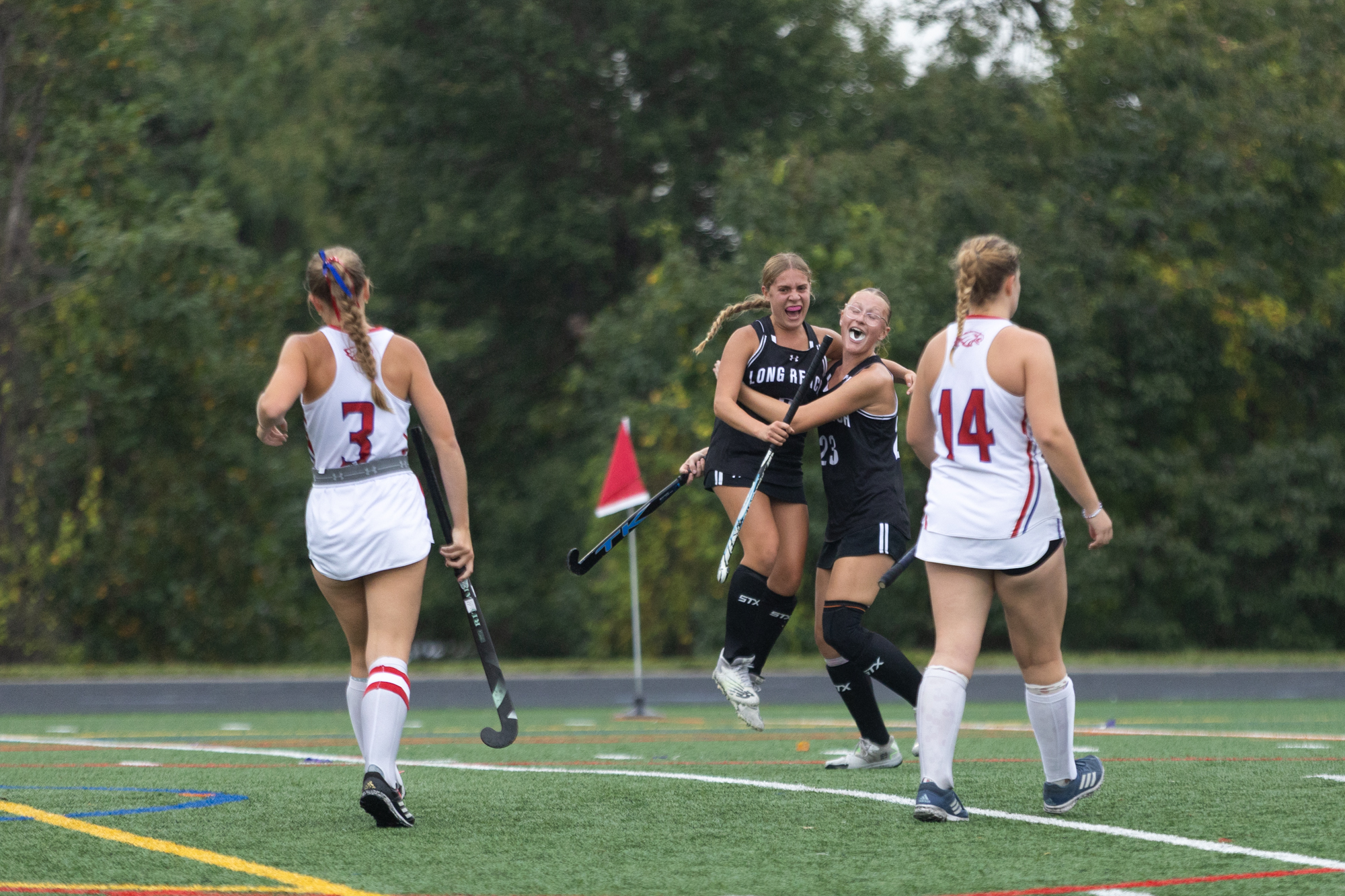 Long Reach’s Keira Brady and Grace Miller celebrate together after...
