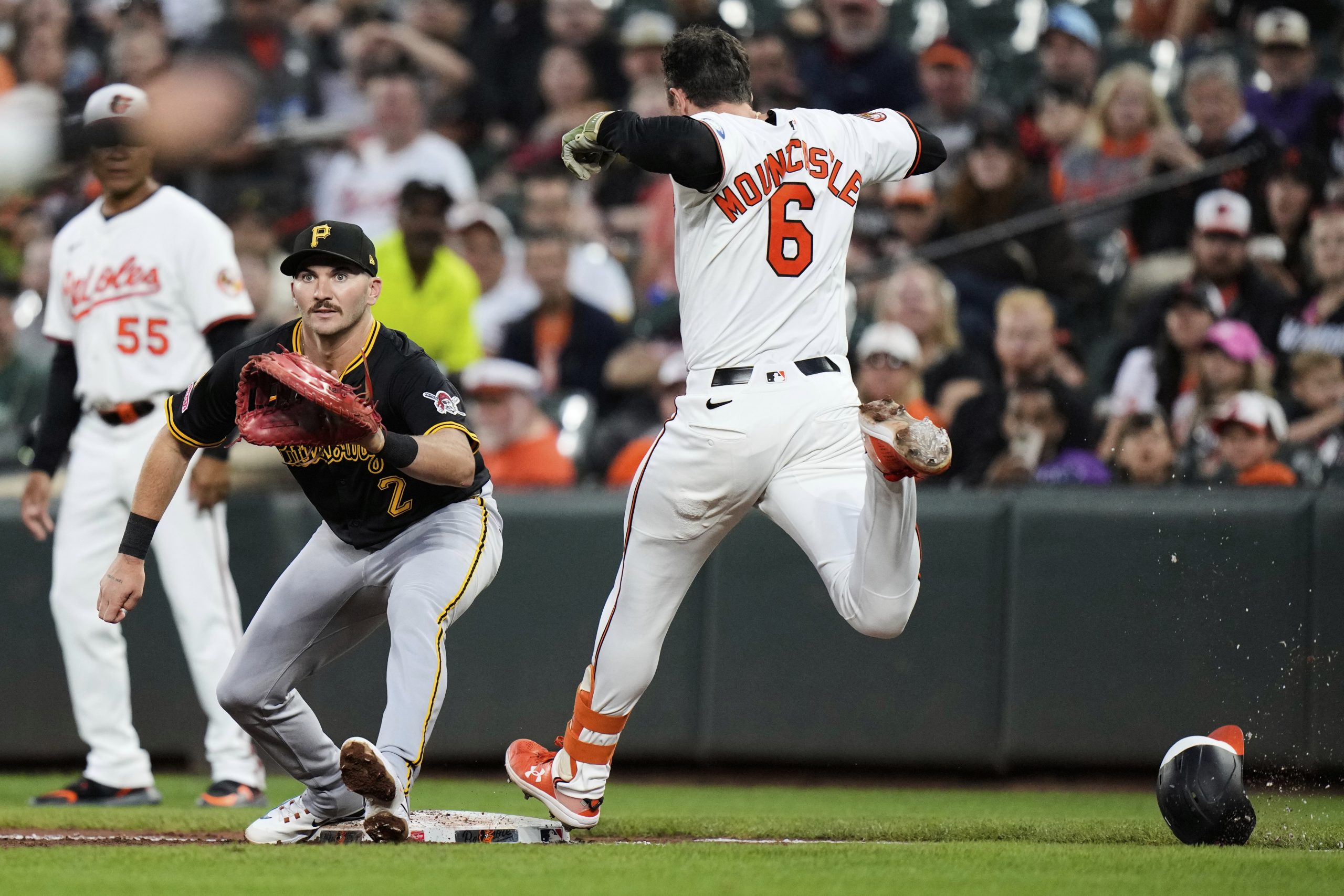 Baltimore Orioles' Ryan Mountcastle (6) beats the throw to first...
