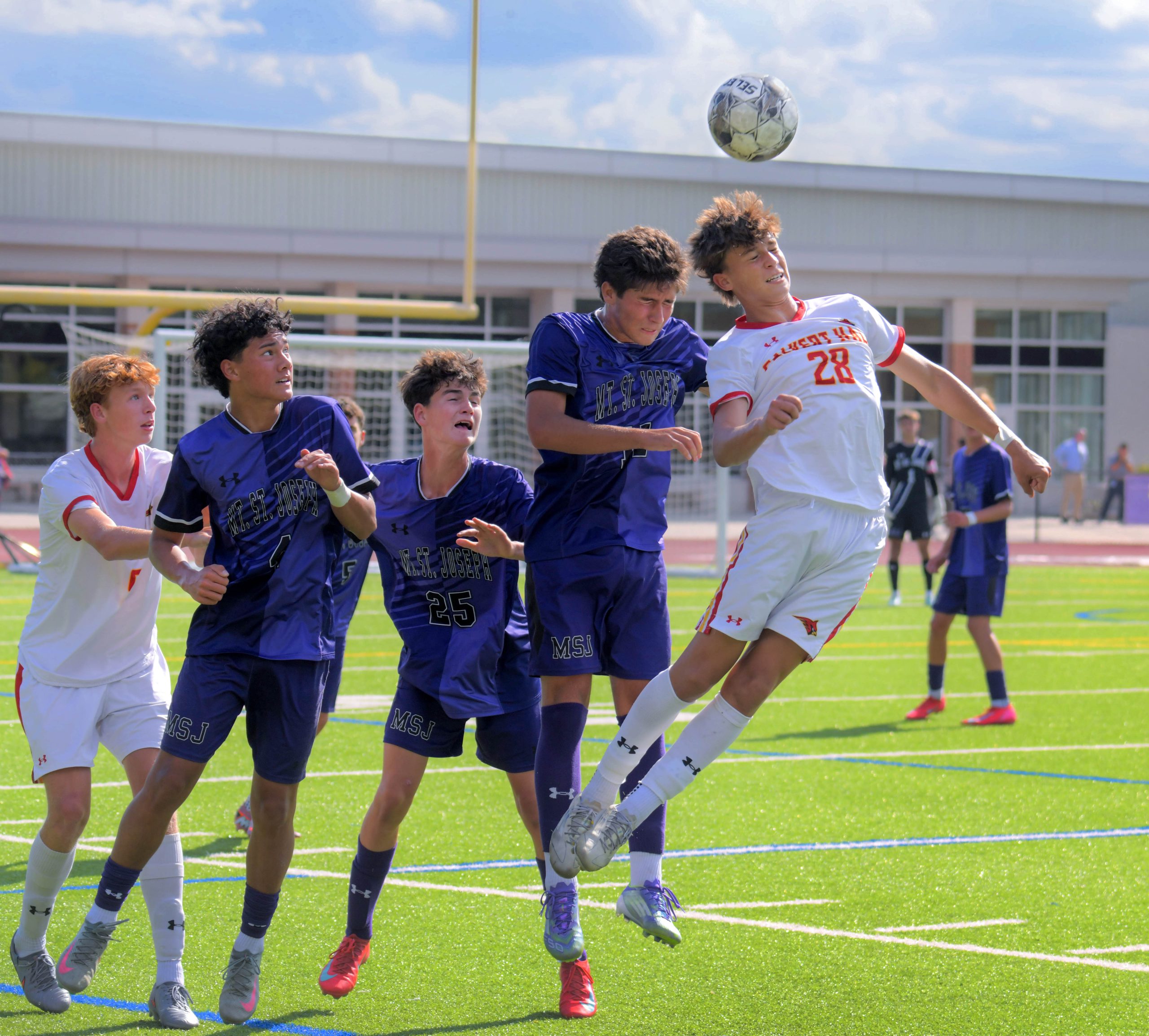 From left, Calvert Hall Cardinals' Harry Vasilios and Mount Saint...