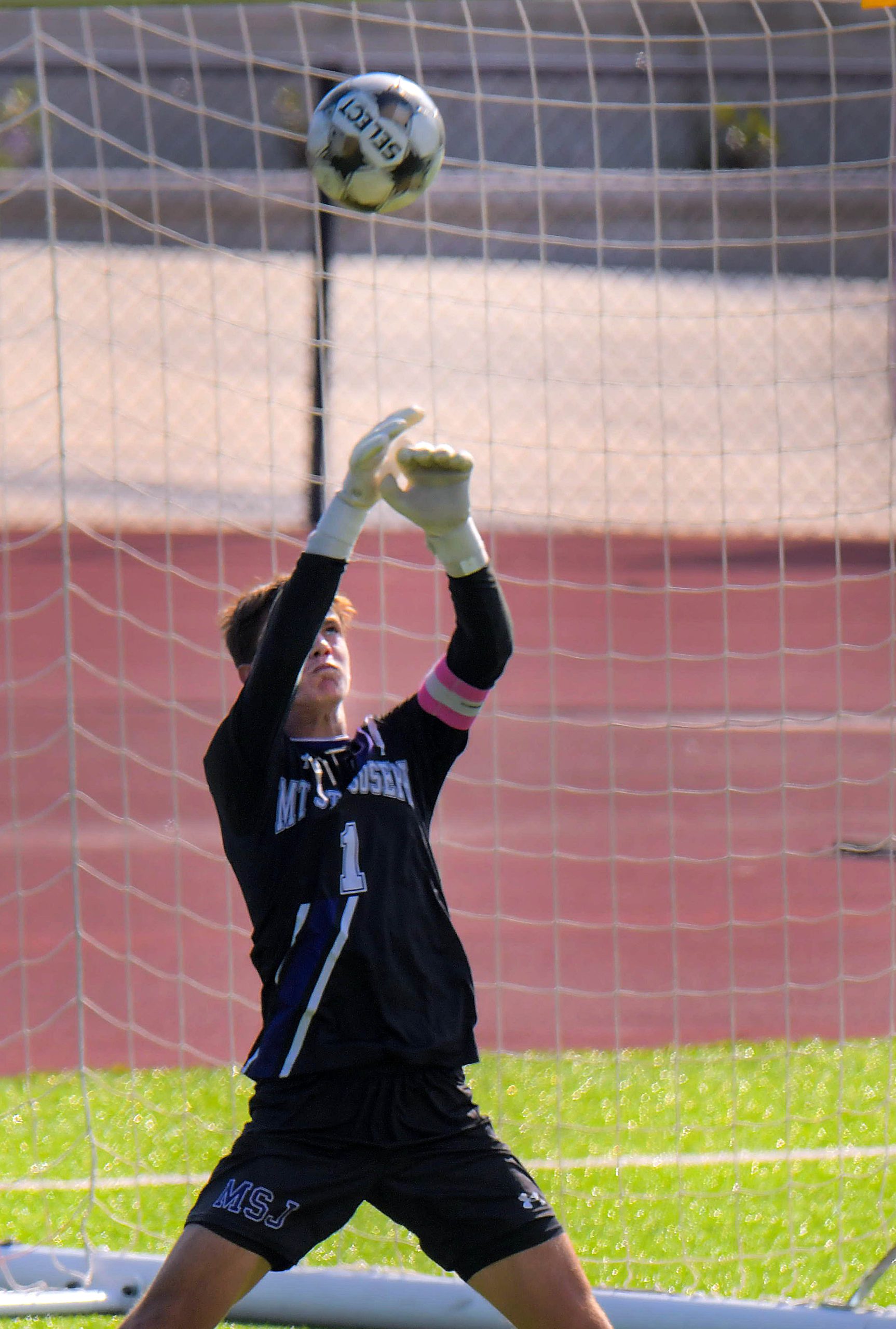 Mount Saint Joseph Gaels goalkeeper Jace Milnes blocks a Calvert...
