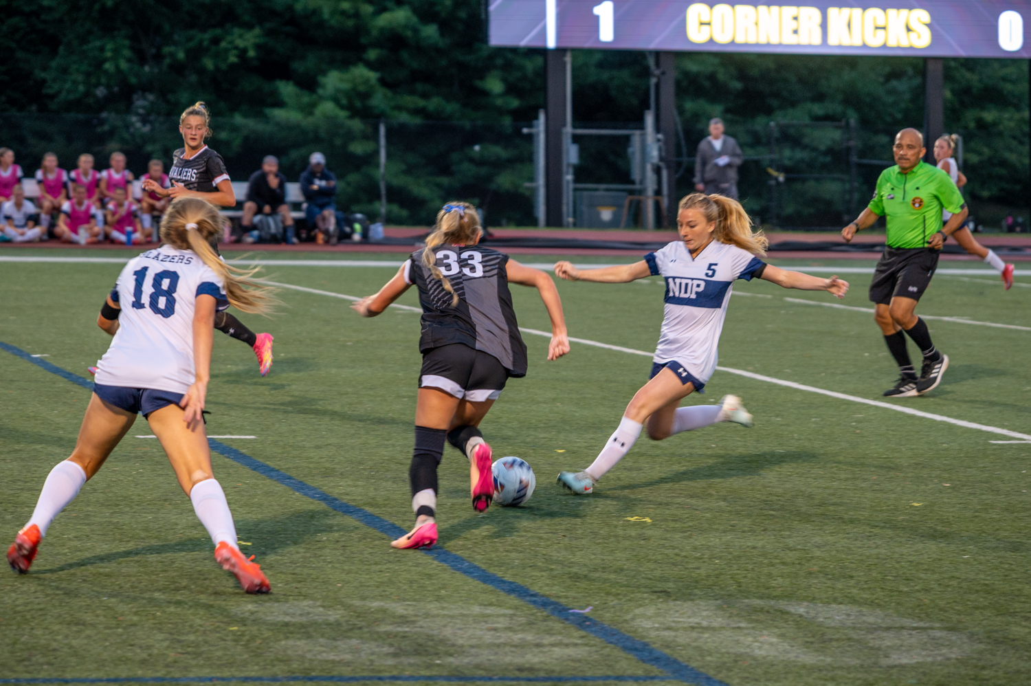 Spalding’s Sophie Bresnan attempts to keep the ball away from...