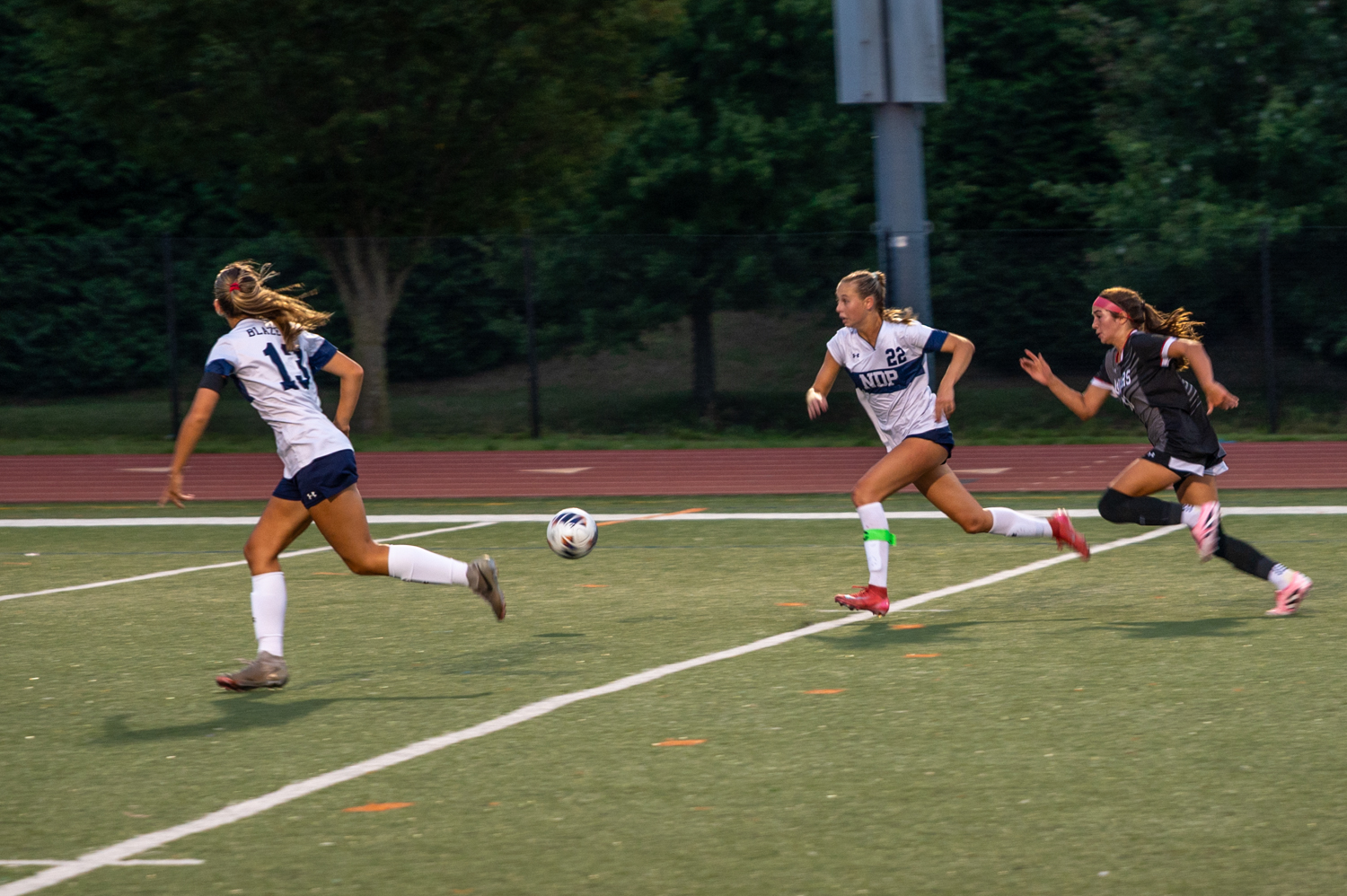 Notre Dame’s Cammie Seal and Bridget Price play defense and...