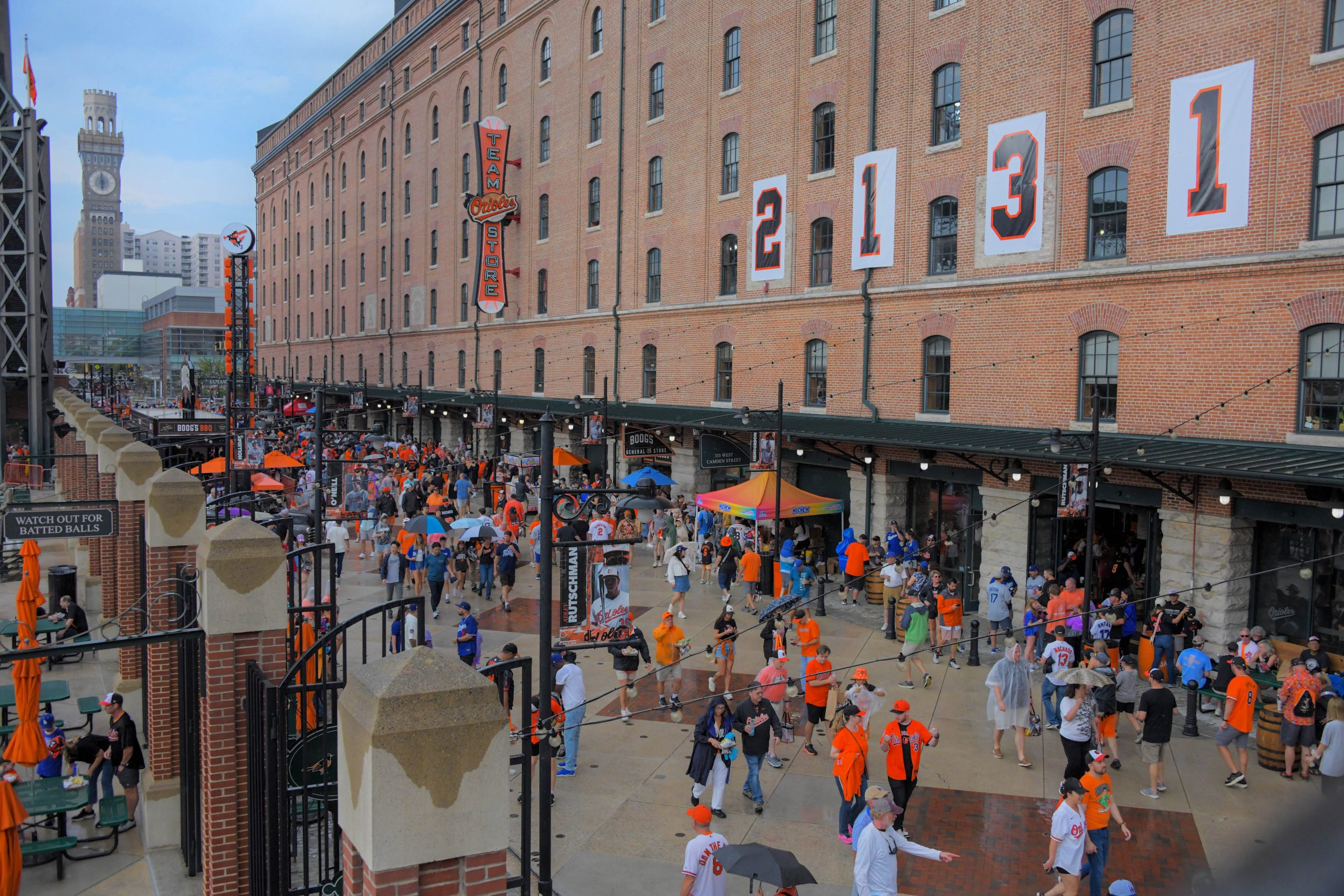 Fans enter beneath the historic numbers hanging outside of the...