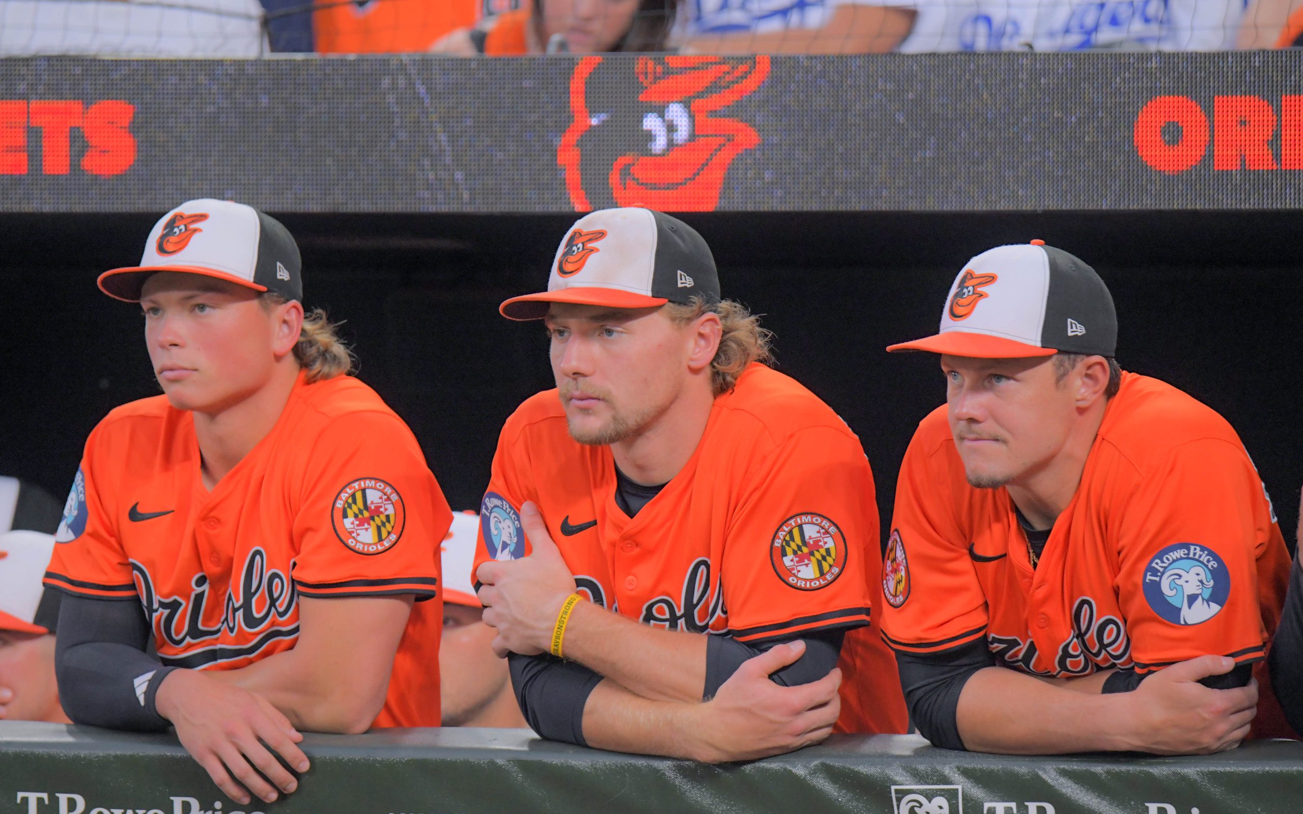 Baltimore Orioles players from left, Jackson Holliday, Gunnar Henderson and...