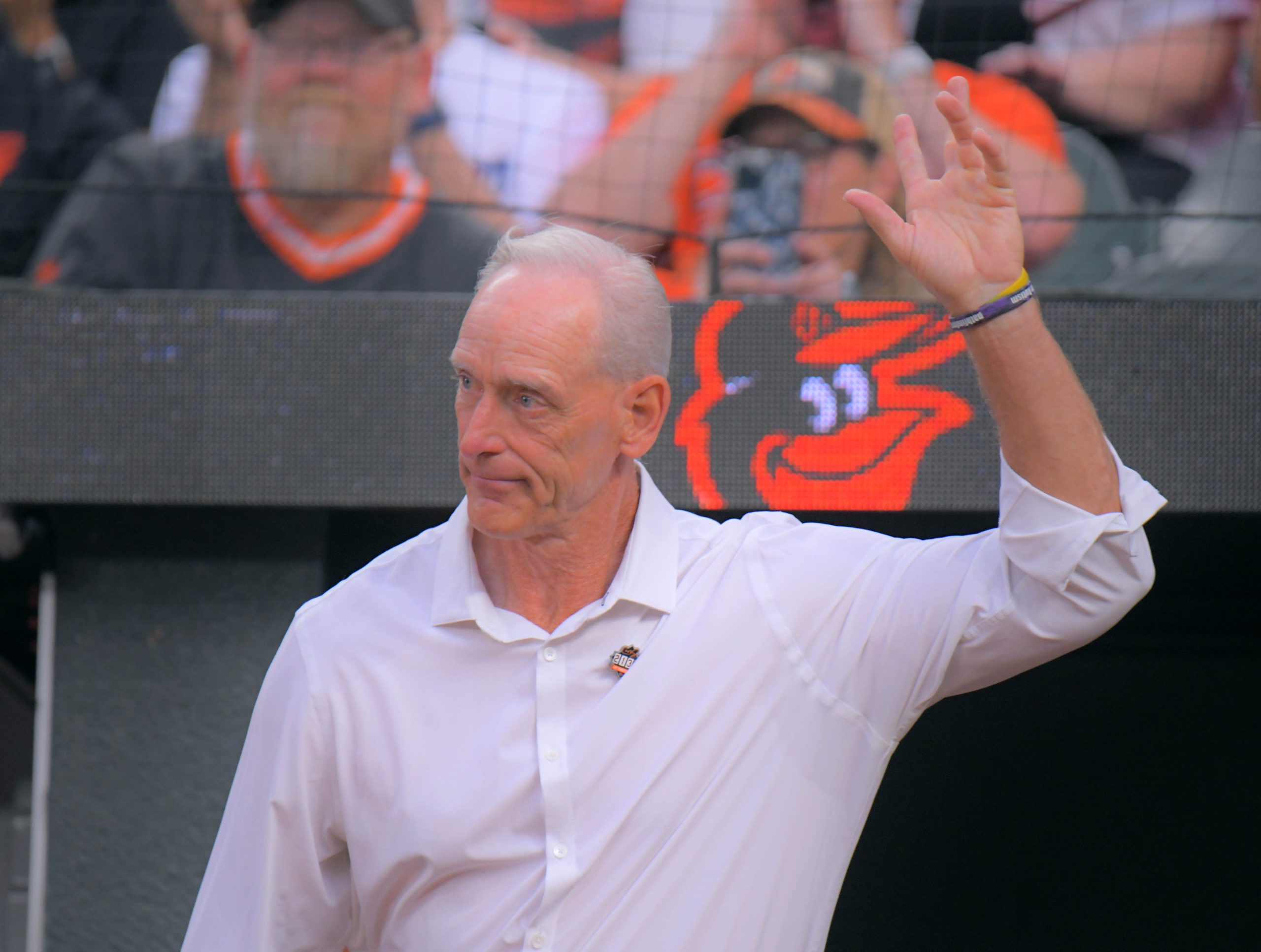 Former Baltimore Orioles player B.J. Surhoff waves during a celebration...