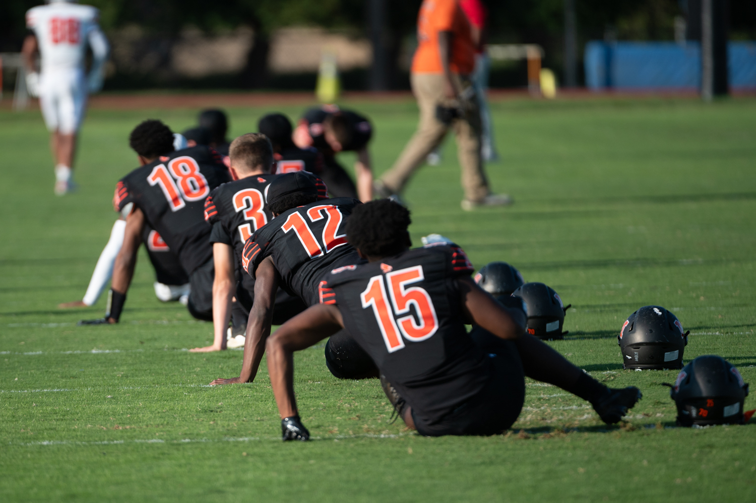 The McDonogh Eagles warm up before their football game against...