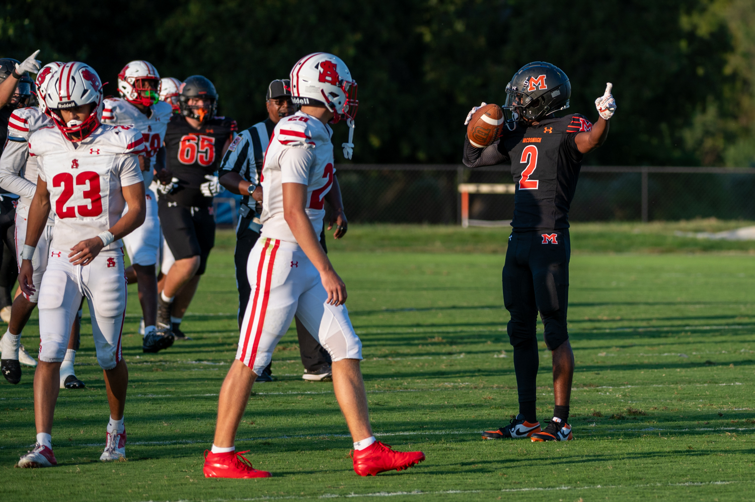 McDonogh wide receiver CJ Davis strikes a pose after completing...