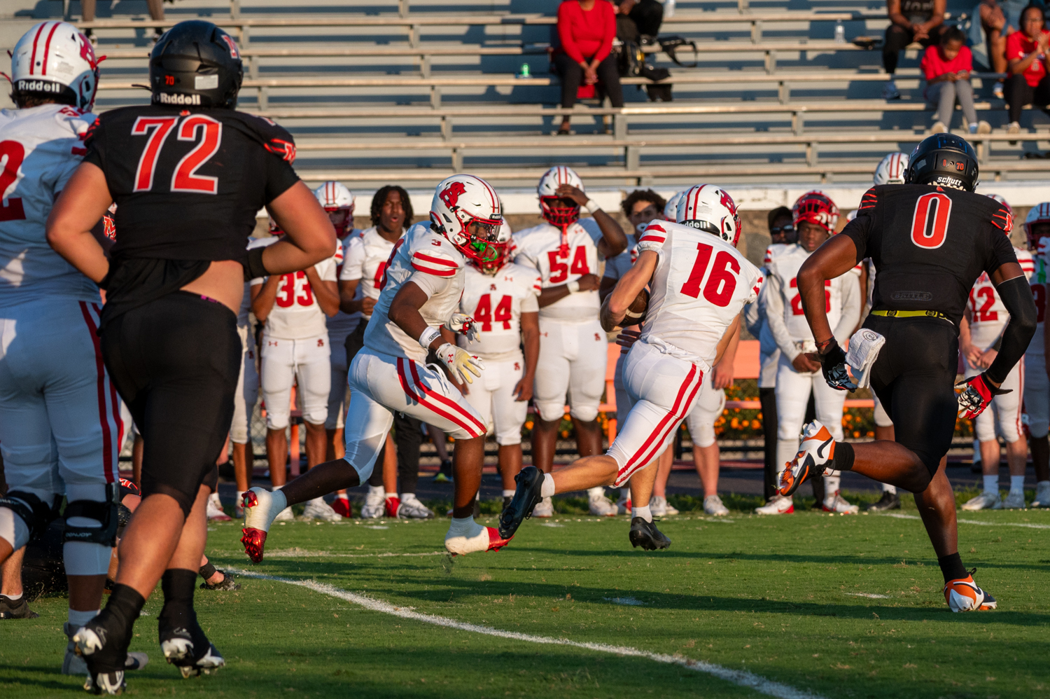 Spalding running back Cam Pinson pushes through McDonogh’s defense with...
