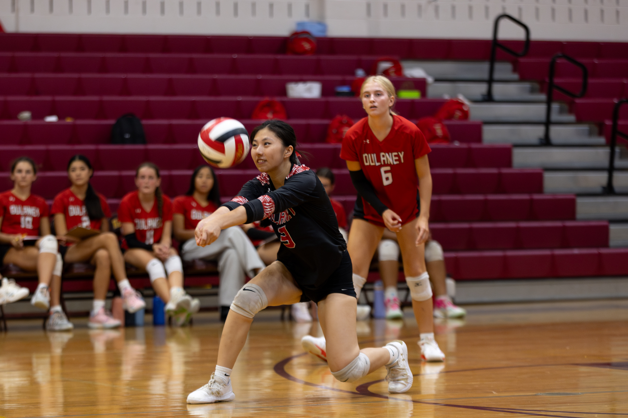 Dulaney’s Eileen Lee returns the ball during the game between...