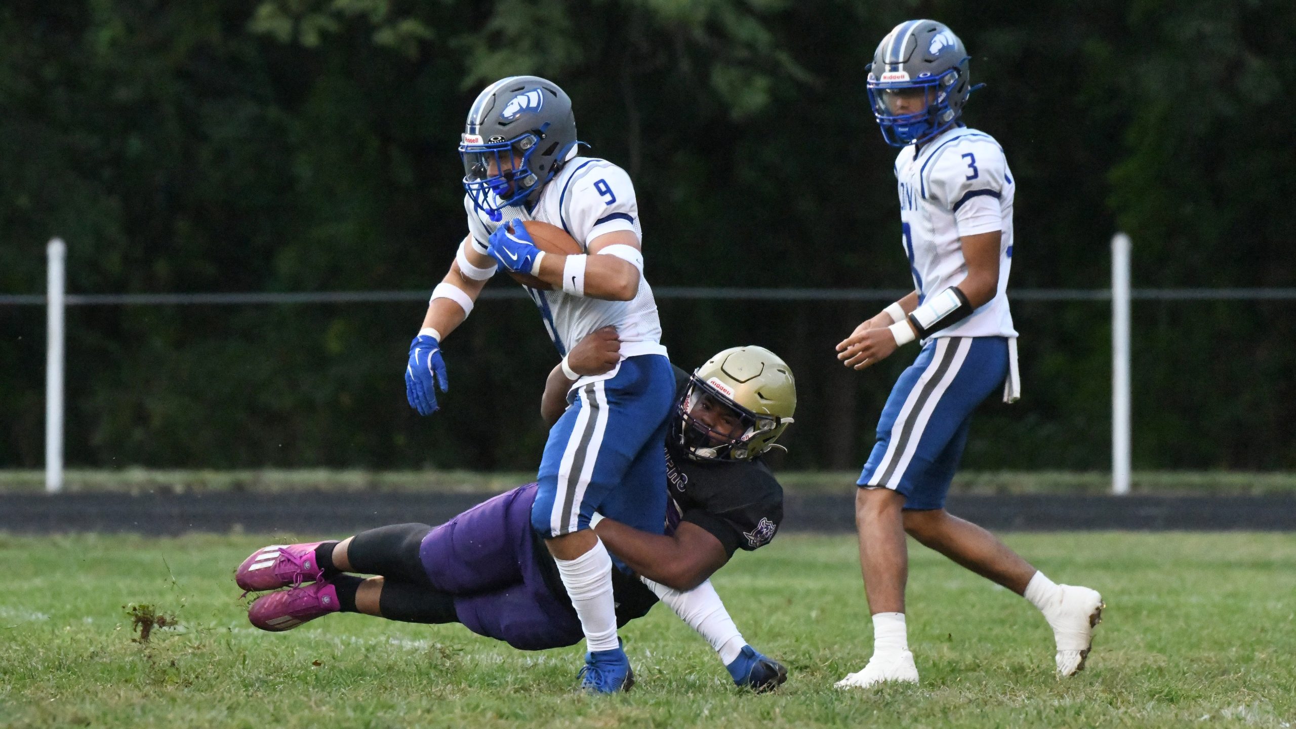 Loch Raven's Eli Edmund wraps up Sparrows Point running back...