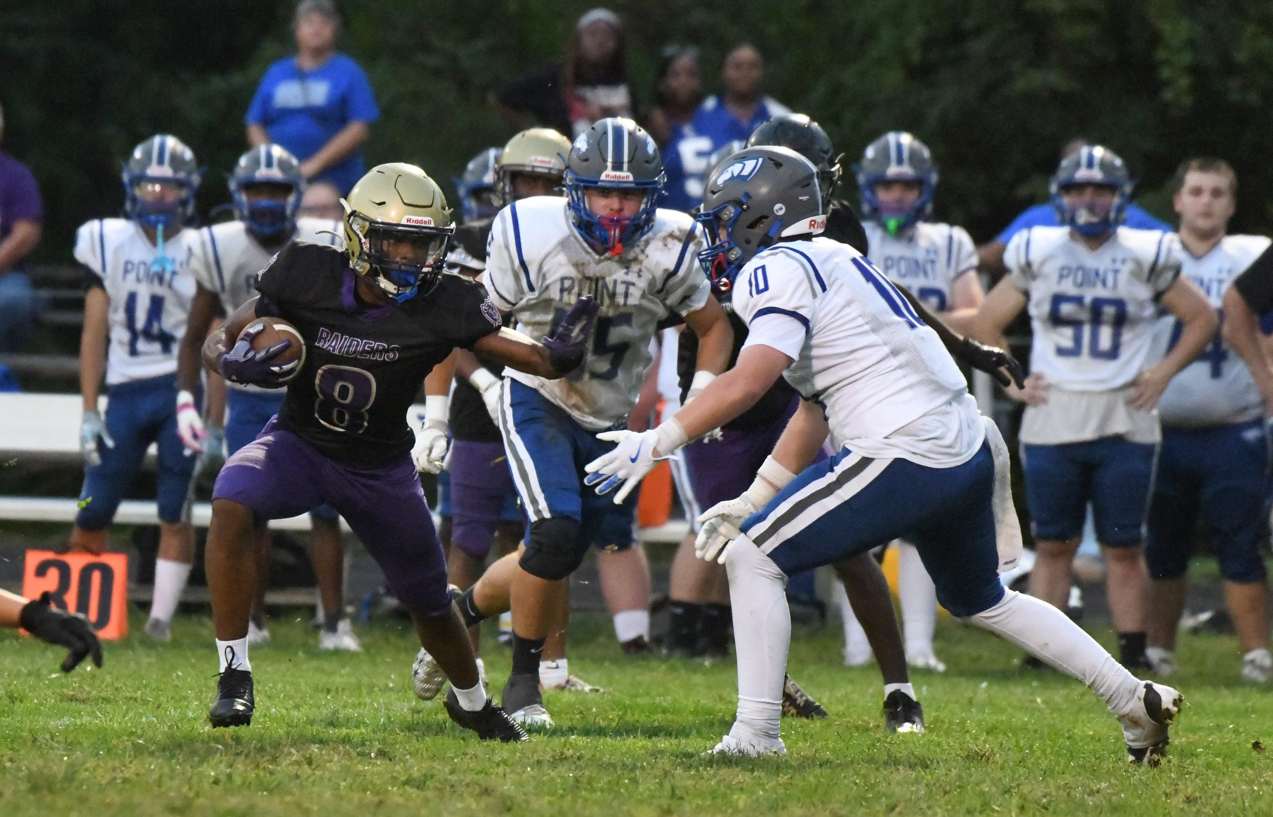 Loch Raven's Khion Gardner tries to elude pressure from Sparrows...