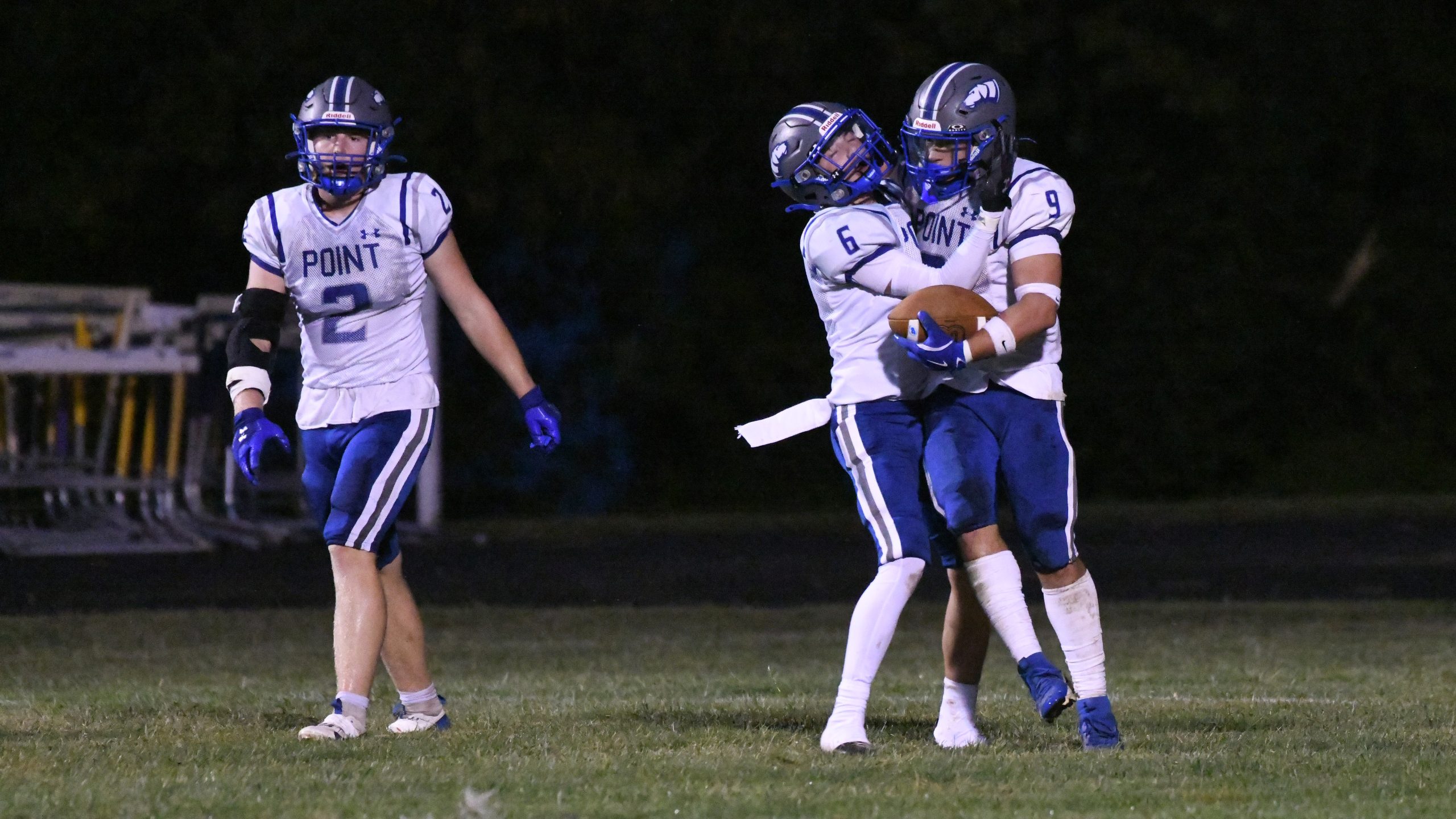 Sparrows Point's Mikey Maynor, right, celebrates scoring a touchdown with...