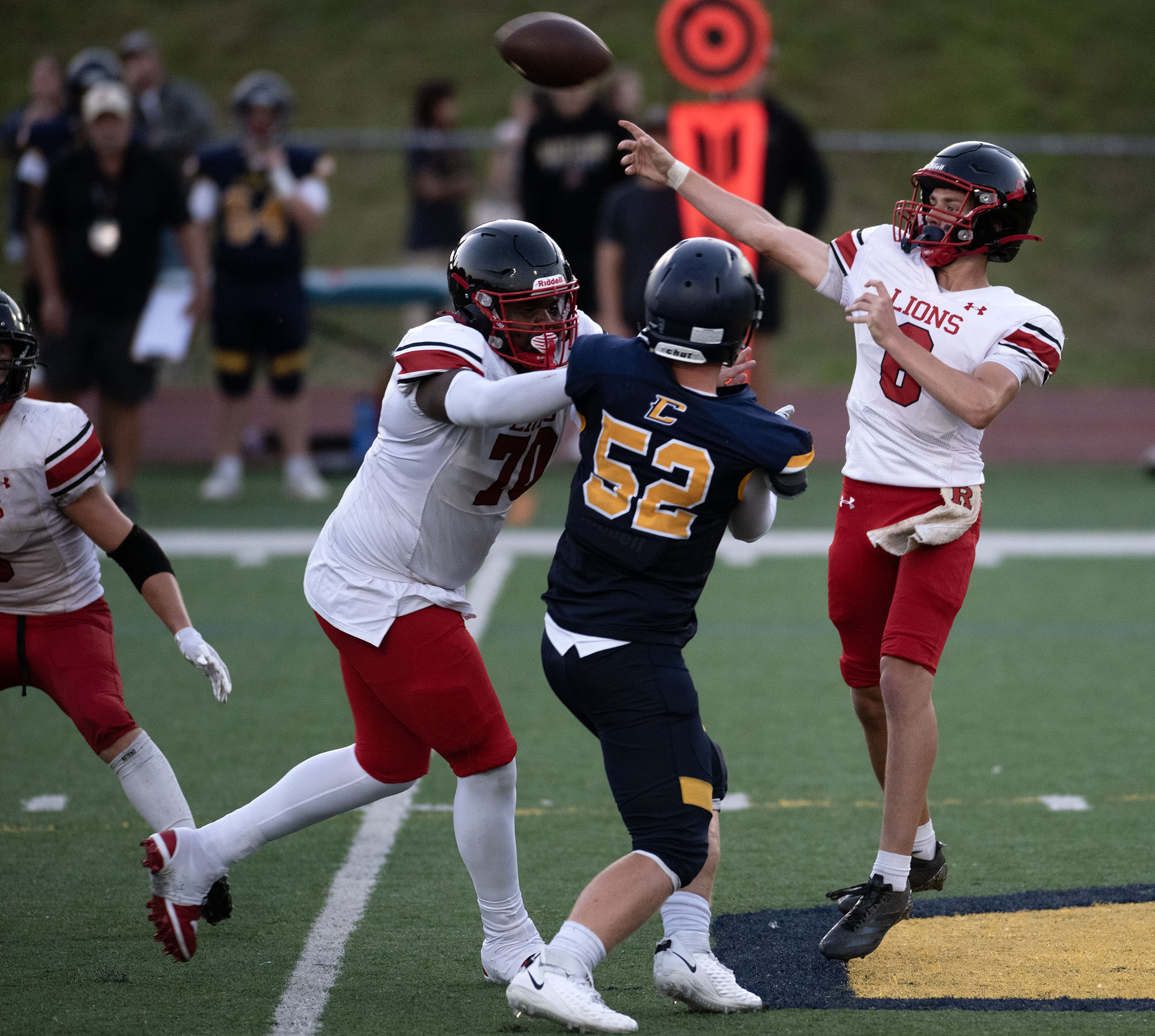 Sept. 12, 2025- Dulaney quarterback Josh Squires launches a pass...
