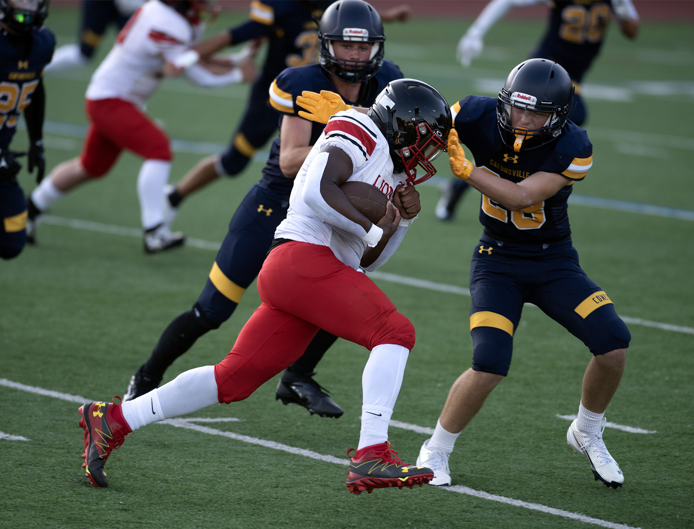 Sept. 12, 2025- Dulaney's Brendan Taylor rushes against Catonsville's Andre...