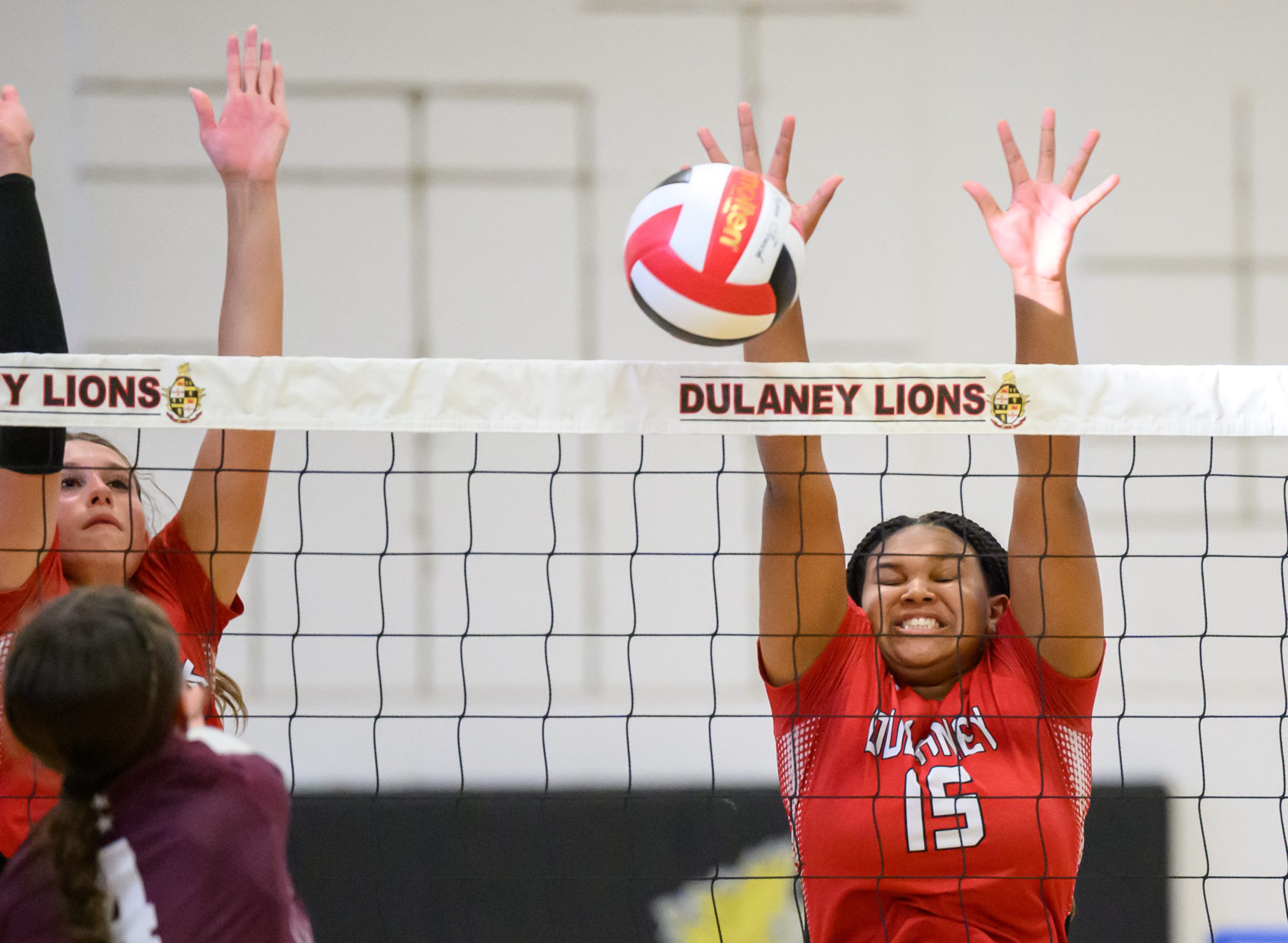 Dulaney’s Kira Logvin-Moore, right, blocks against Towson’s Madi McGinness as...