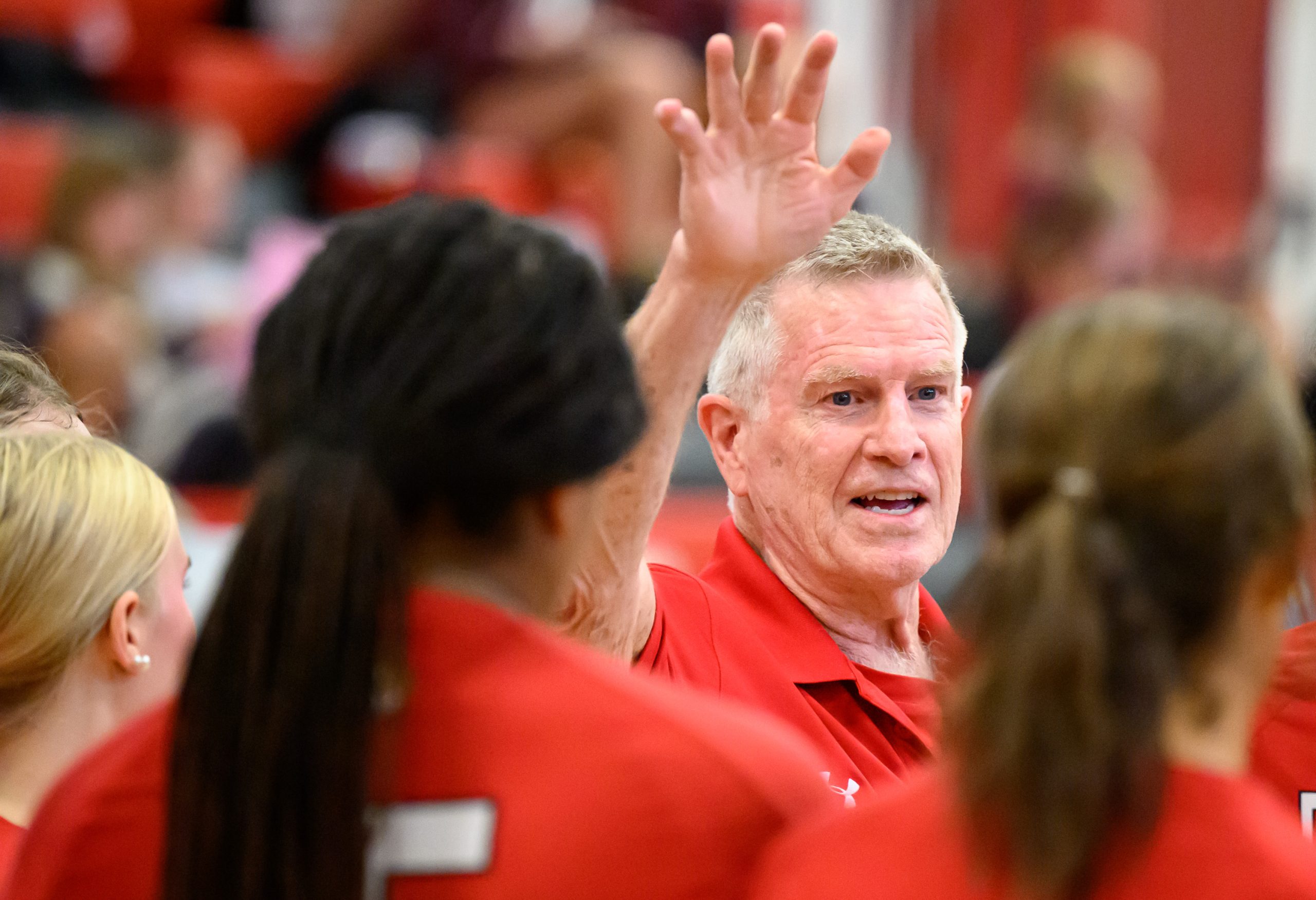 Dulaney head coach Cary Lyon leads his team against Towson...