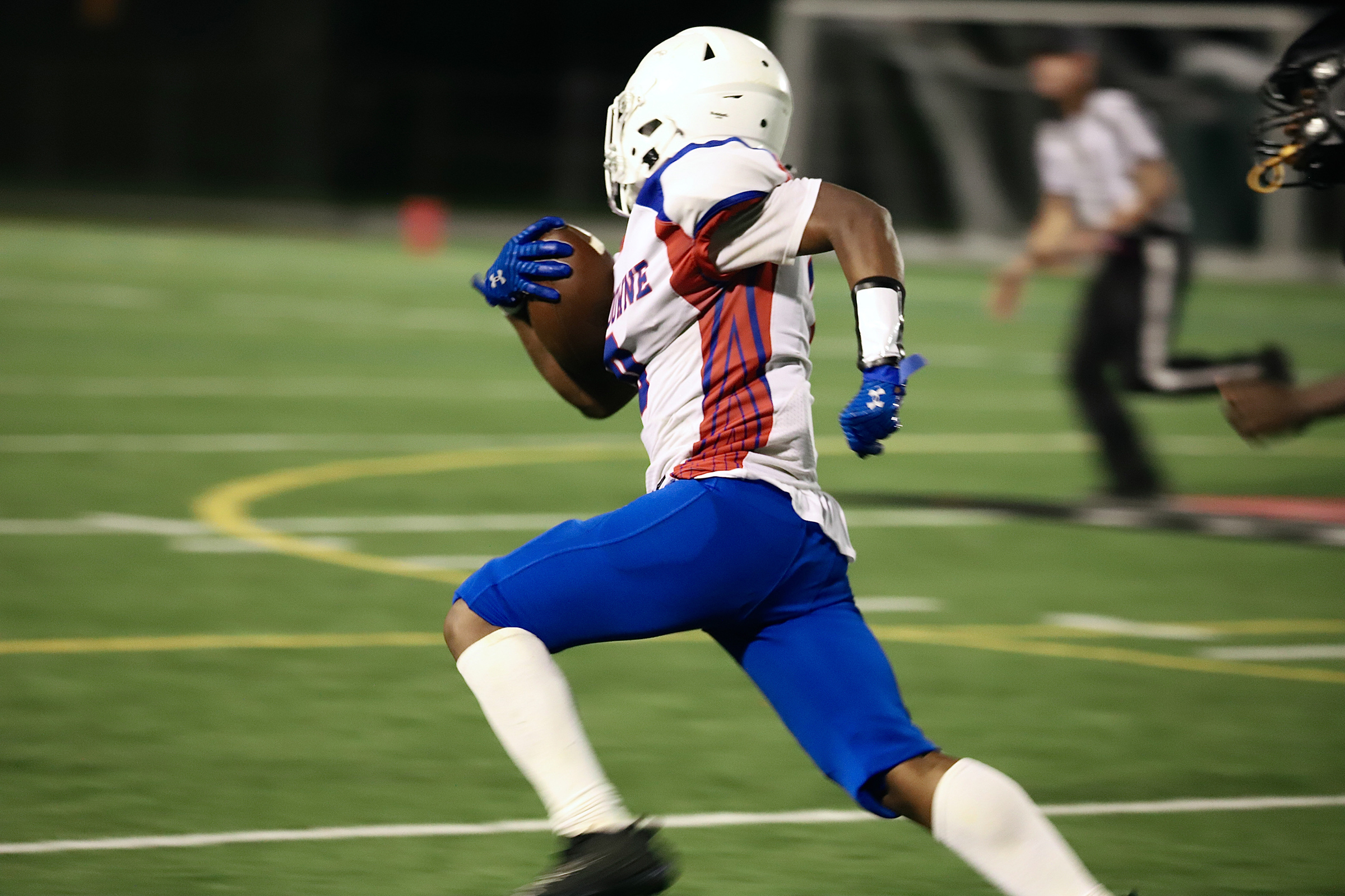 Lansdowne’s running back Tyree Commodore runs past Western Tech’s defense...