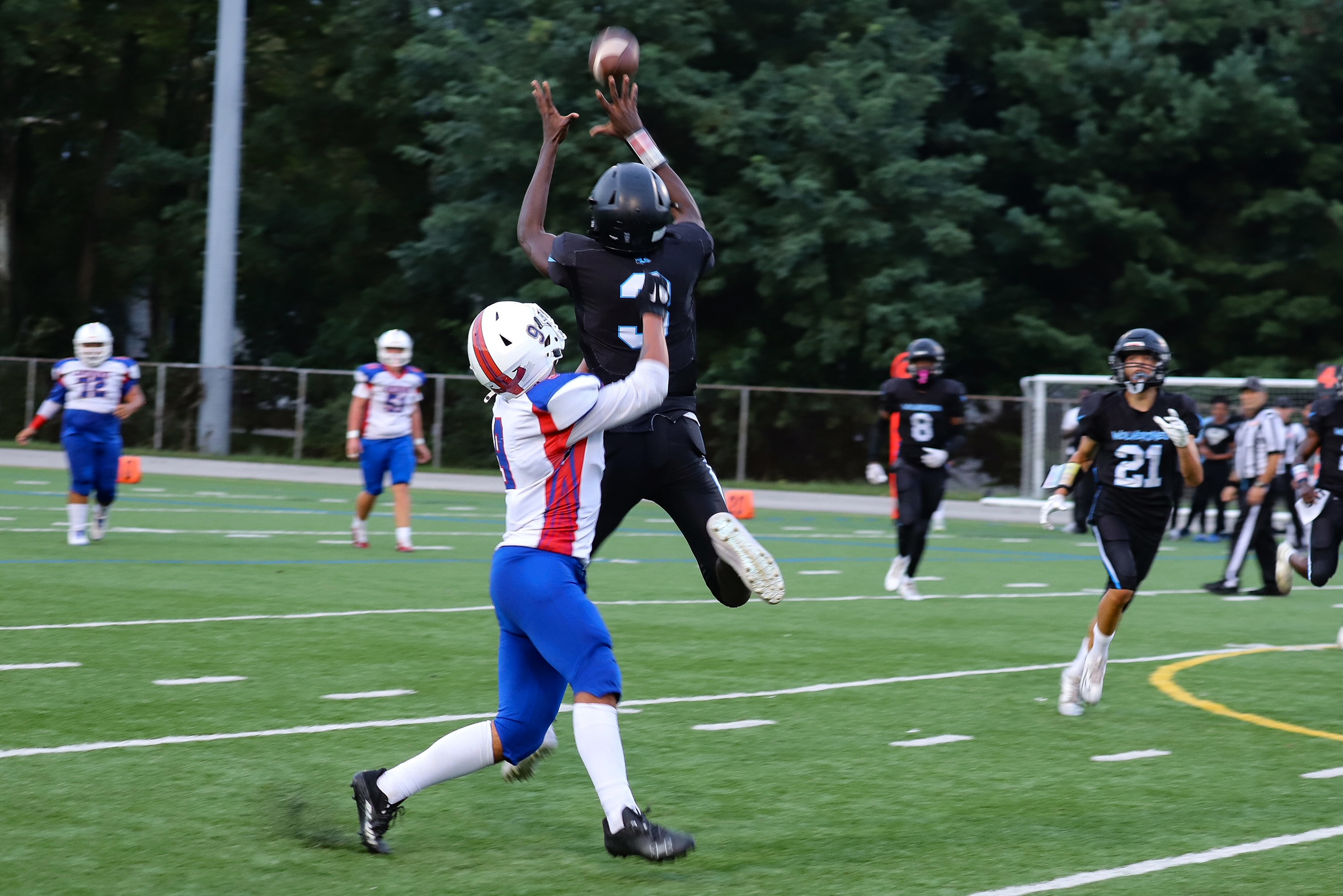Western Tech’s wide receiver #3 Chibike Uzoukwu catches a pass...