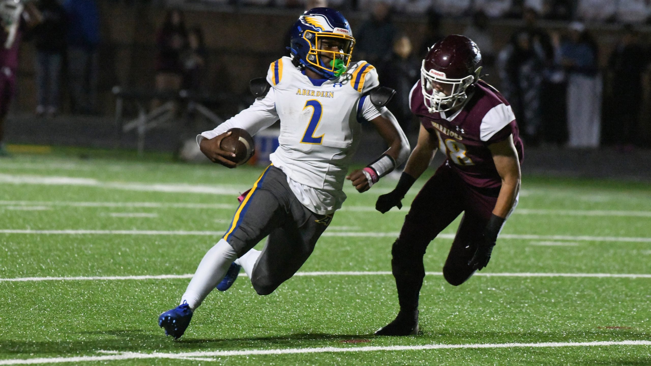 Aberdeen's Collin Rogers tries to elude Havre de Grace defender...