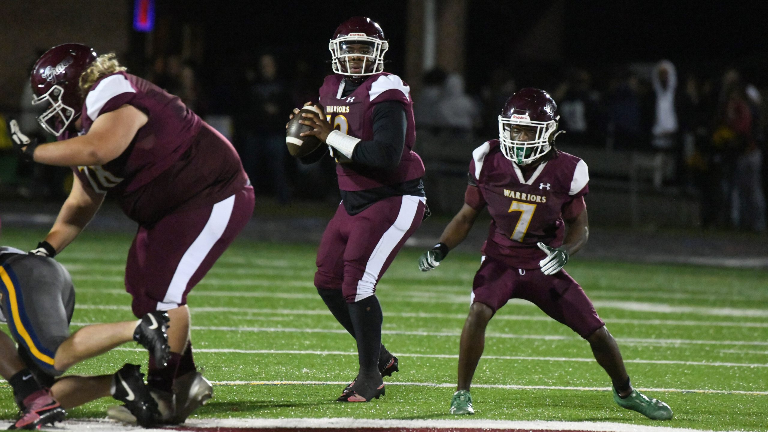 Havre de Grace quarterback Julian Ringgold looks downfield for an...