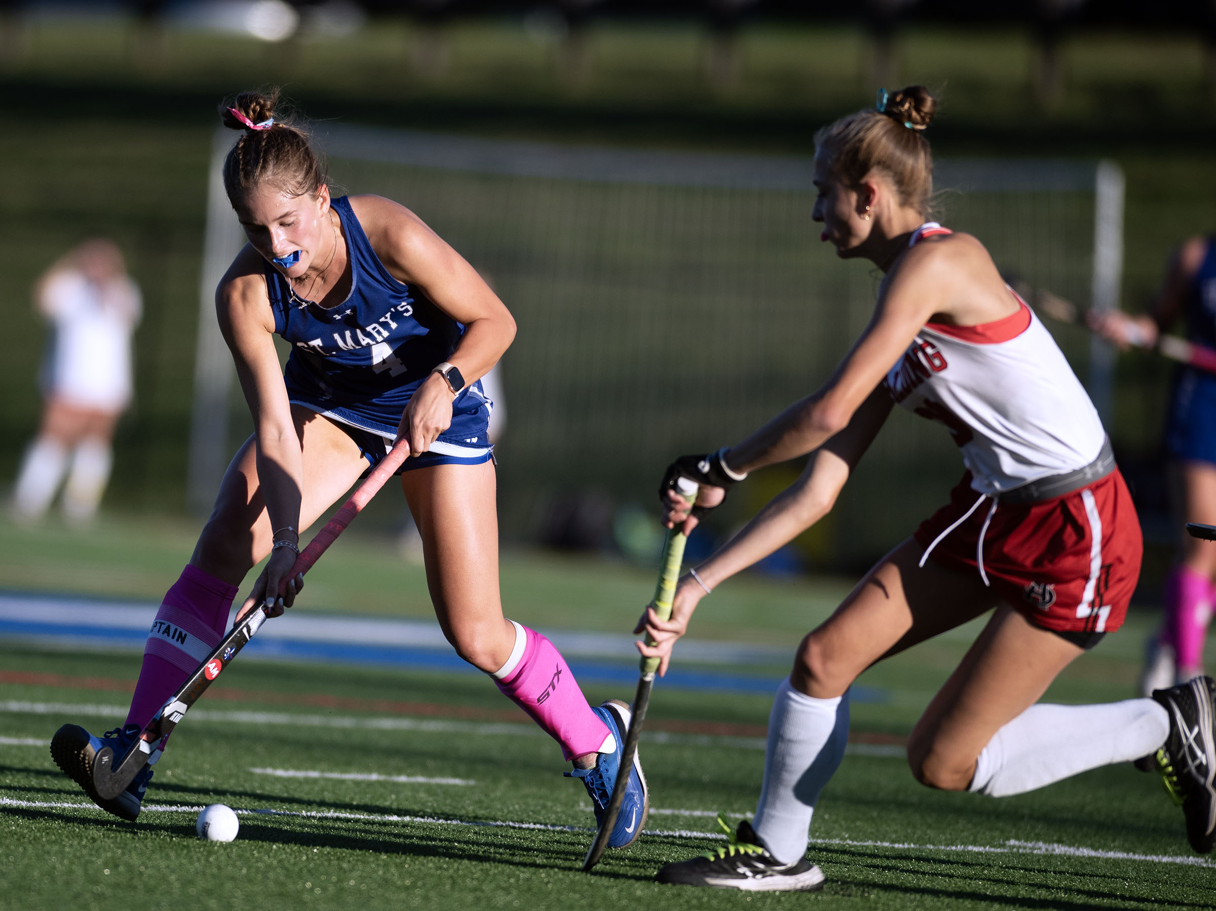 St. Mary’s Addy Drain, left, sends a pass against Spalding’s...