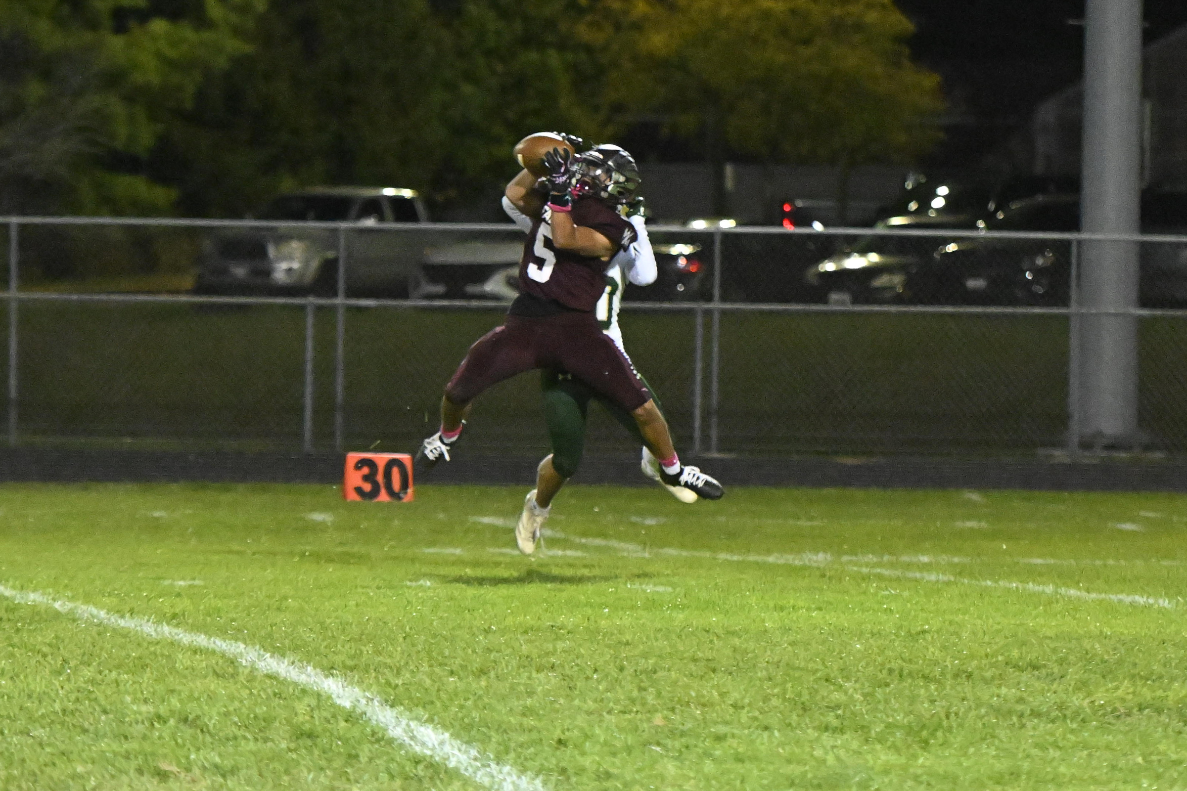 Jake Andolina makes a catch during a football game at...