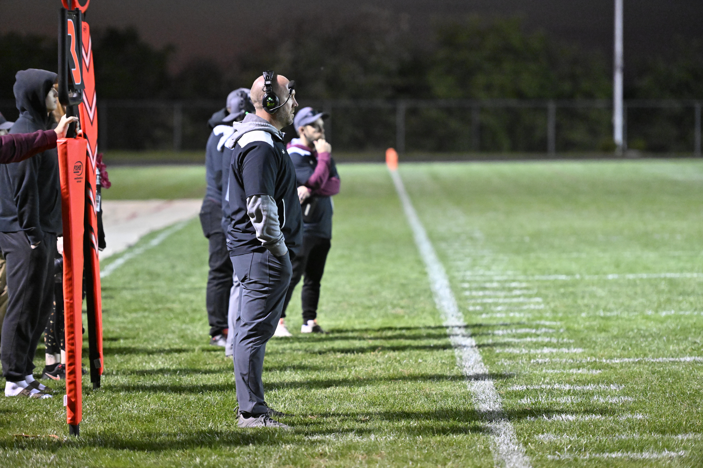 Winters Mill coach Matt Miller watches his team from the...
