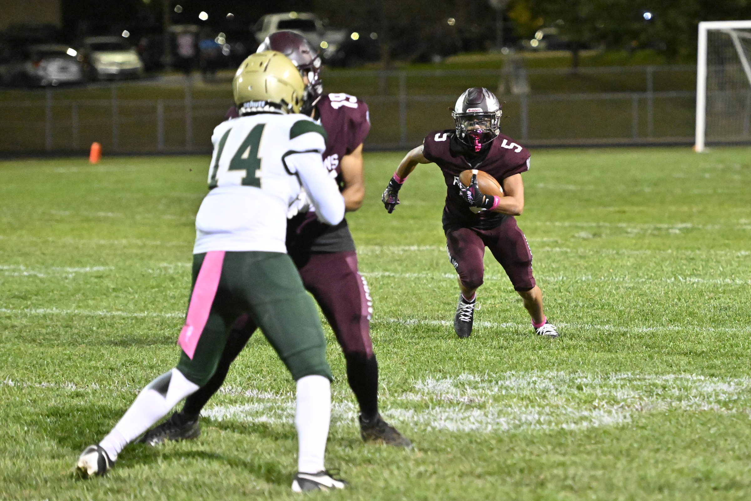 Jake Andolina follows his blockers on a big run during...