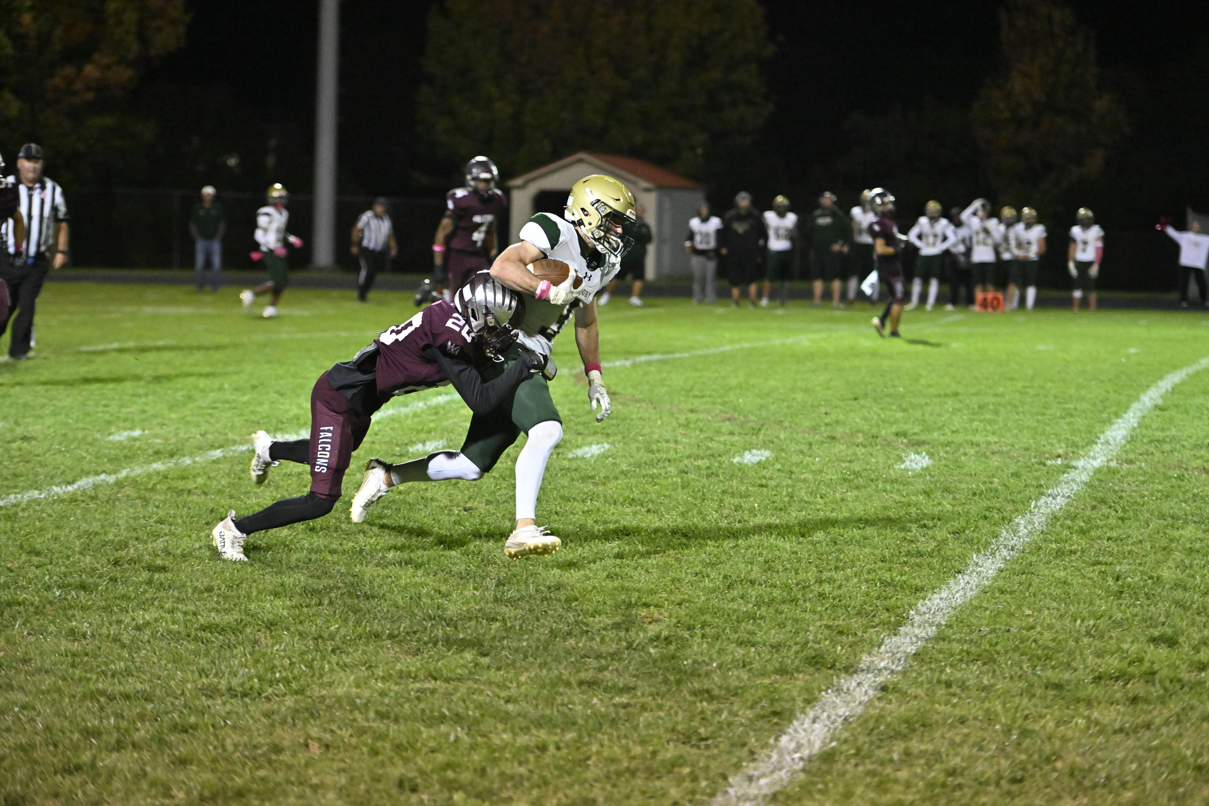 Century's William Koenig is brought down after a catch by...